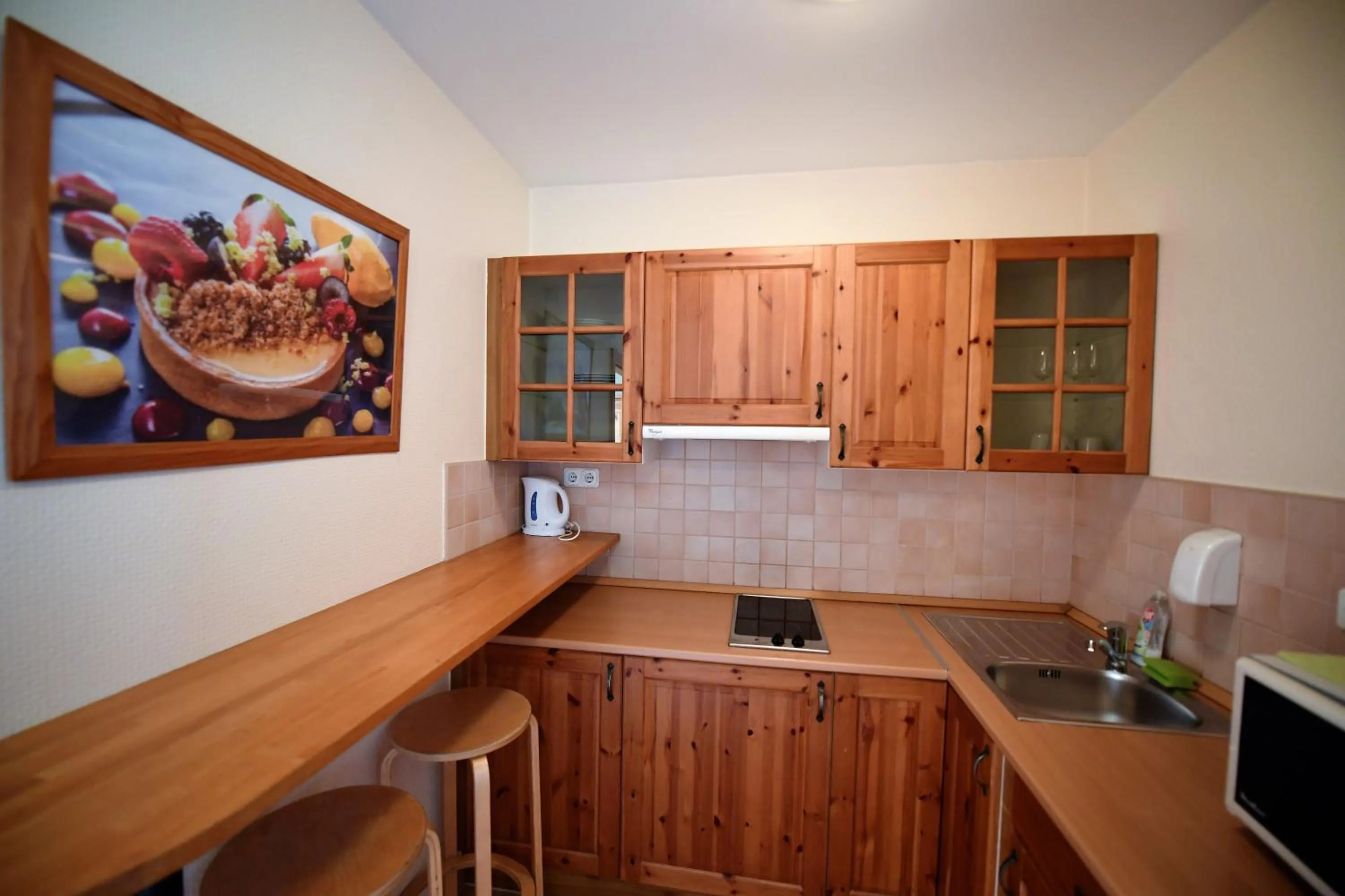 Kitchen or kitchenette in Imola Udvarház Dessert Hotel