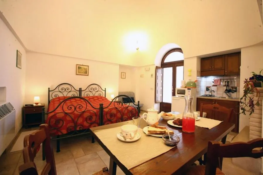 Dining area, Bed in Truddhi Casa e Cucina di Puglia