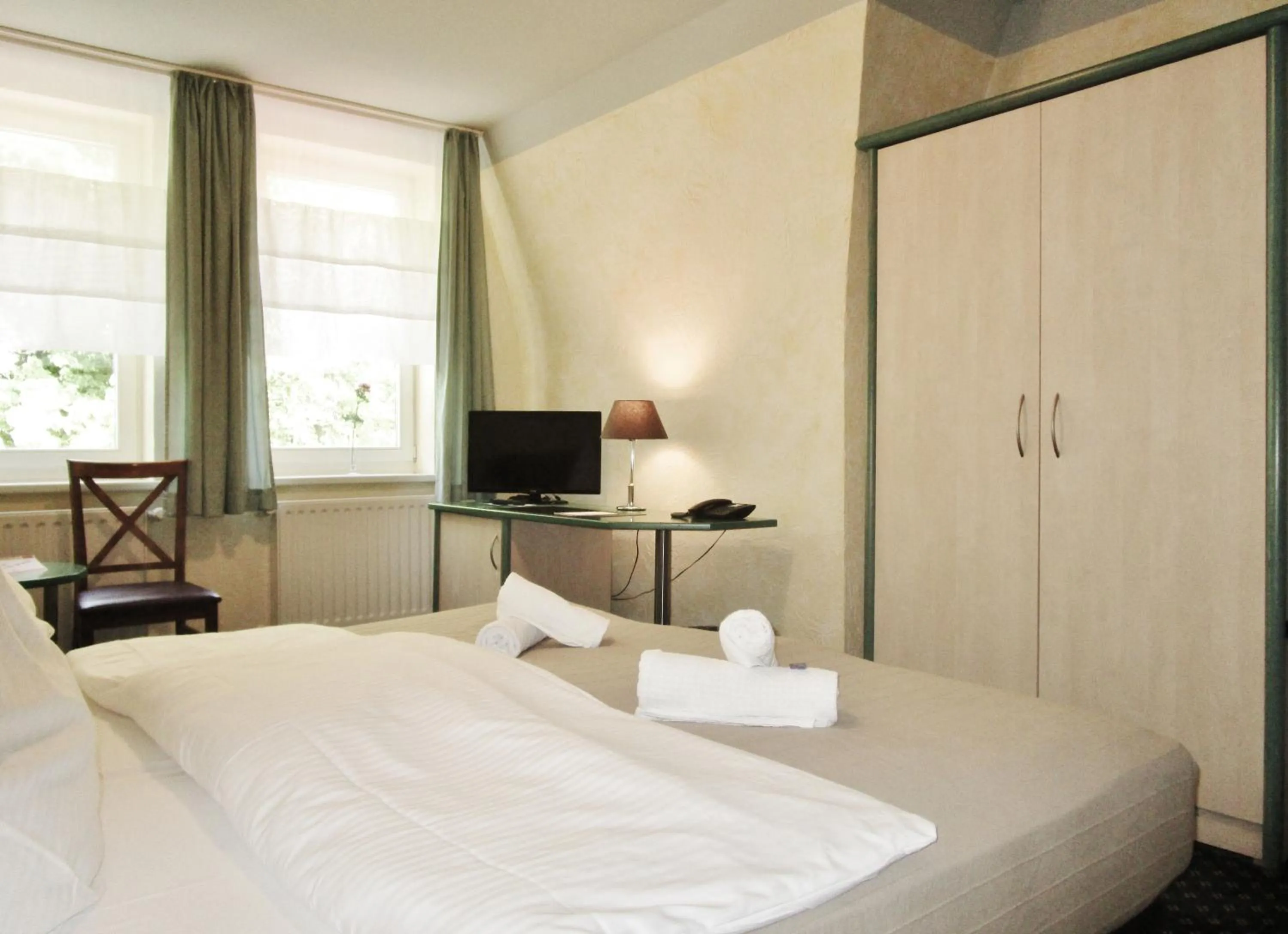 Photo of the whole room, Bed in Hotel Ostseestern