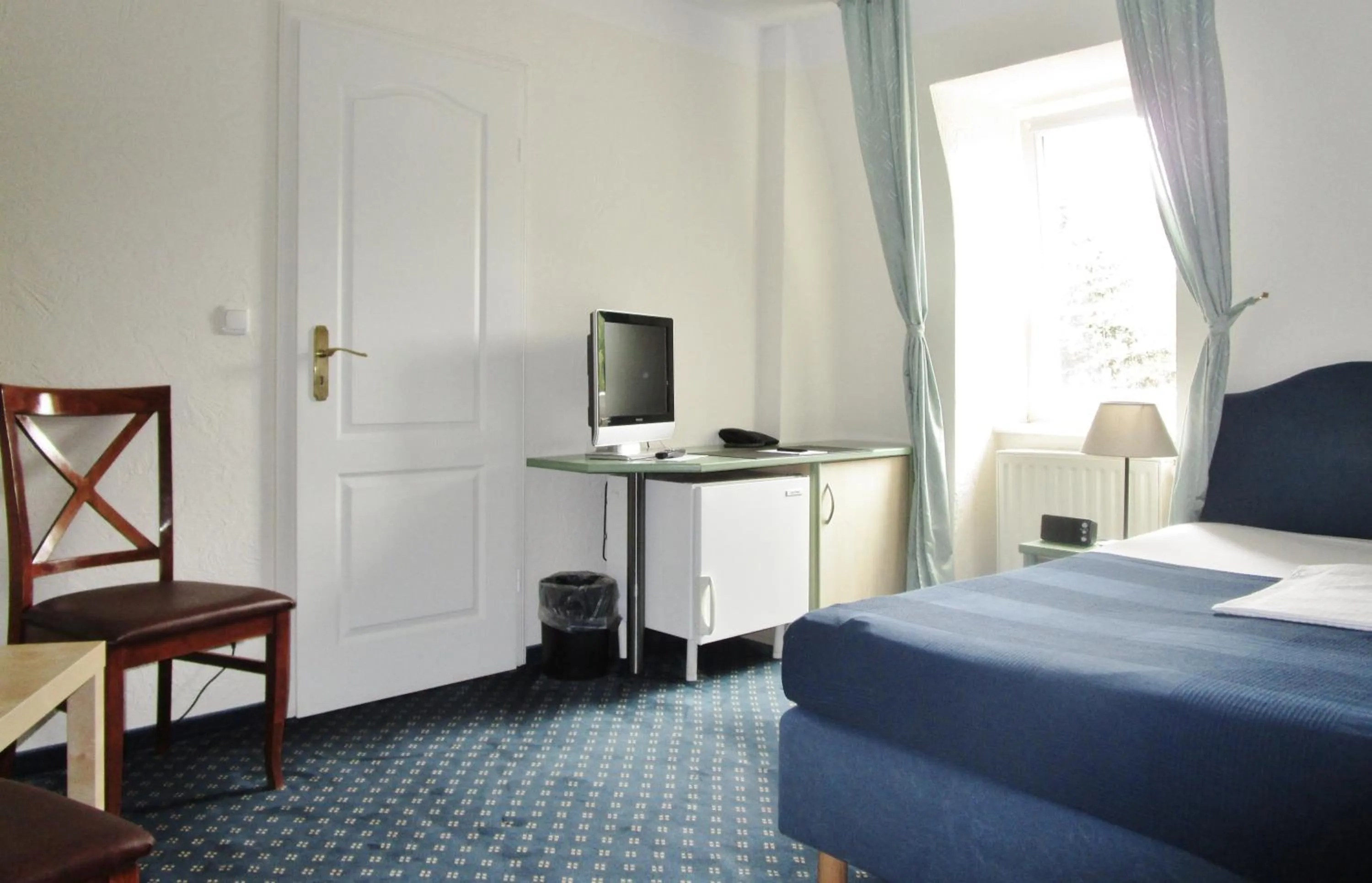 Photo of the whole room, Bed in Hotel Ostseestern