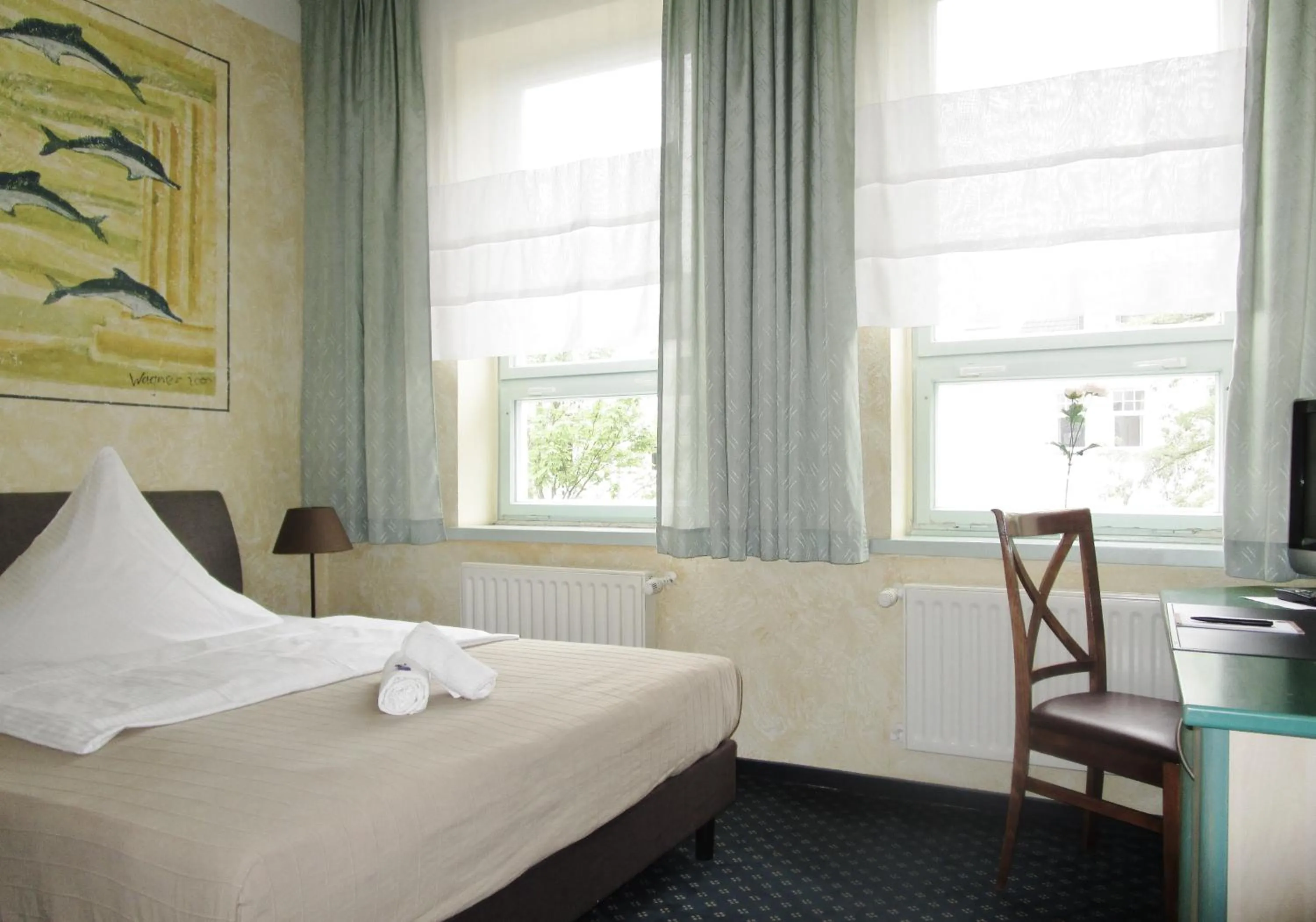 Photo of the whole room, Bed in Hotel Ostseestern