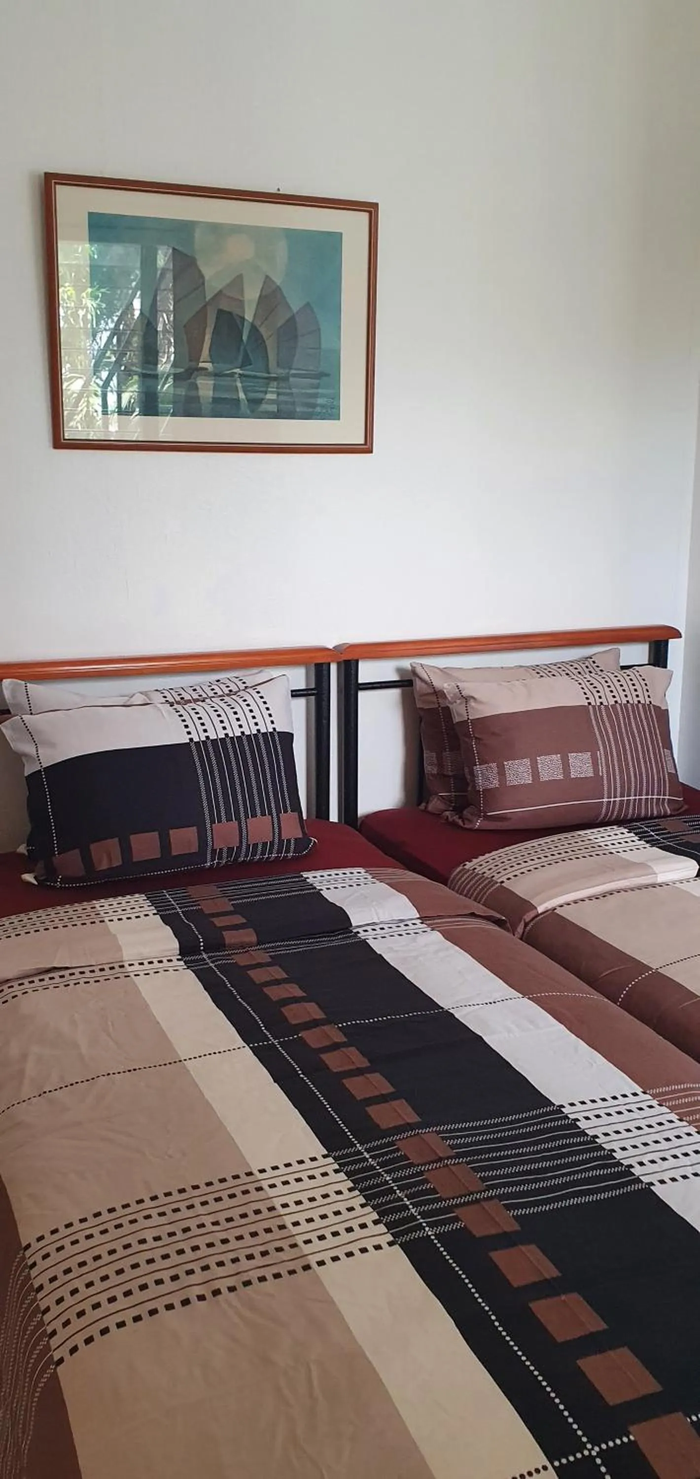 Bed in Lola's Guest House