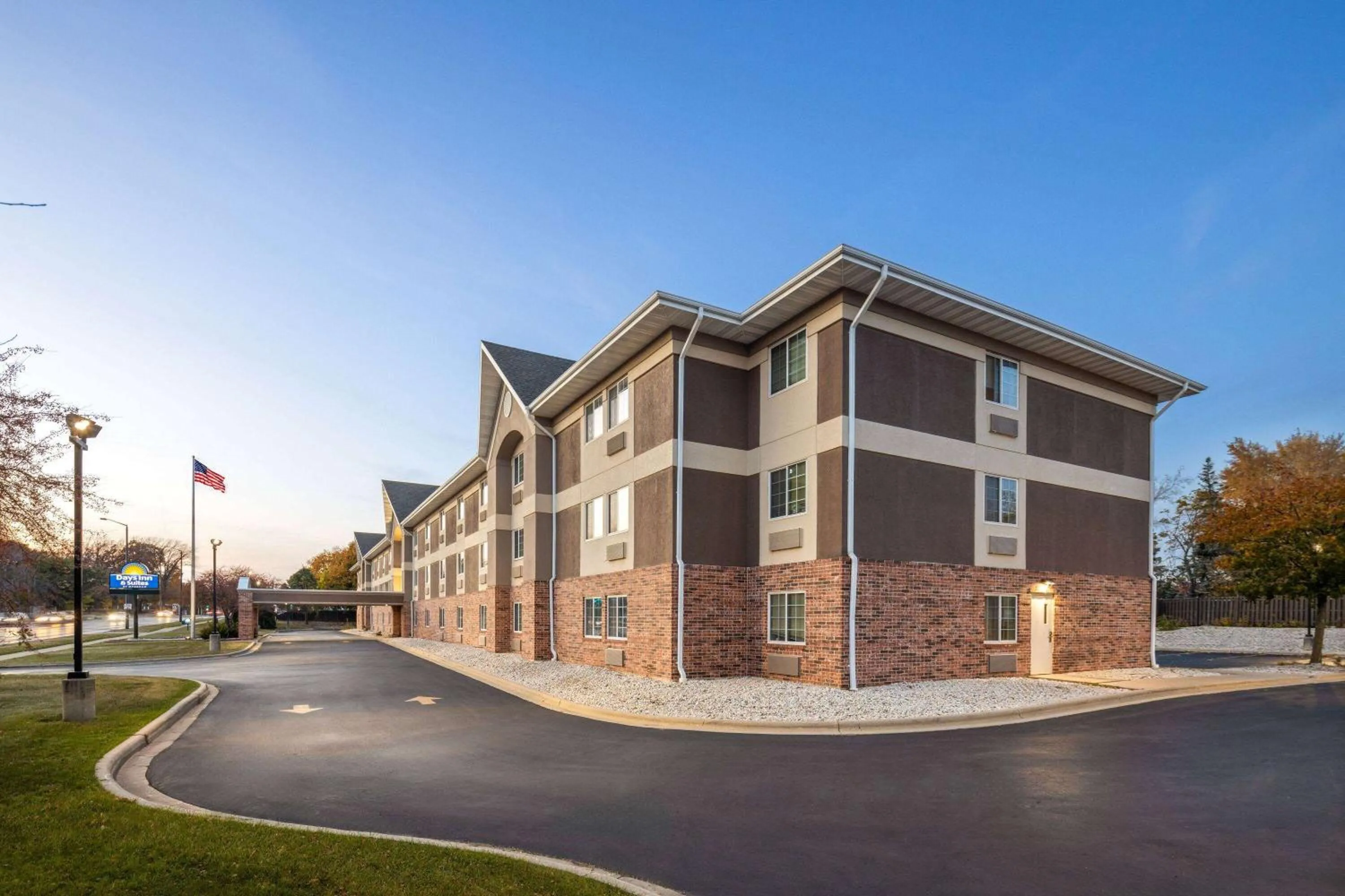 Property building in Days Inn & Suites by Wyndham Green Bay WI