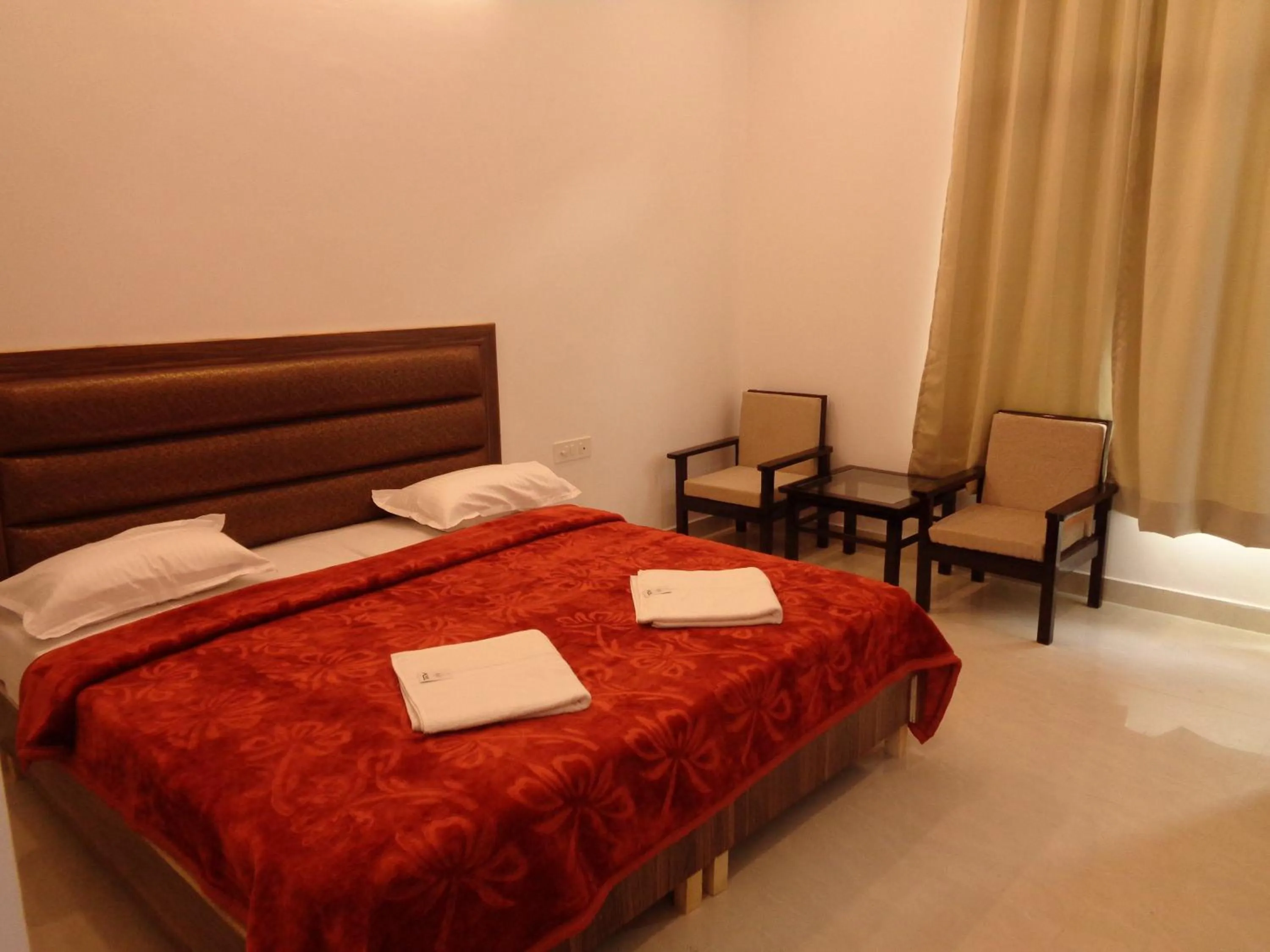 Photo of the whole room, Bed in Hotel Tapovan Cottage