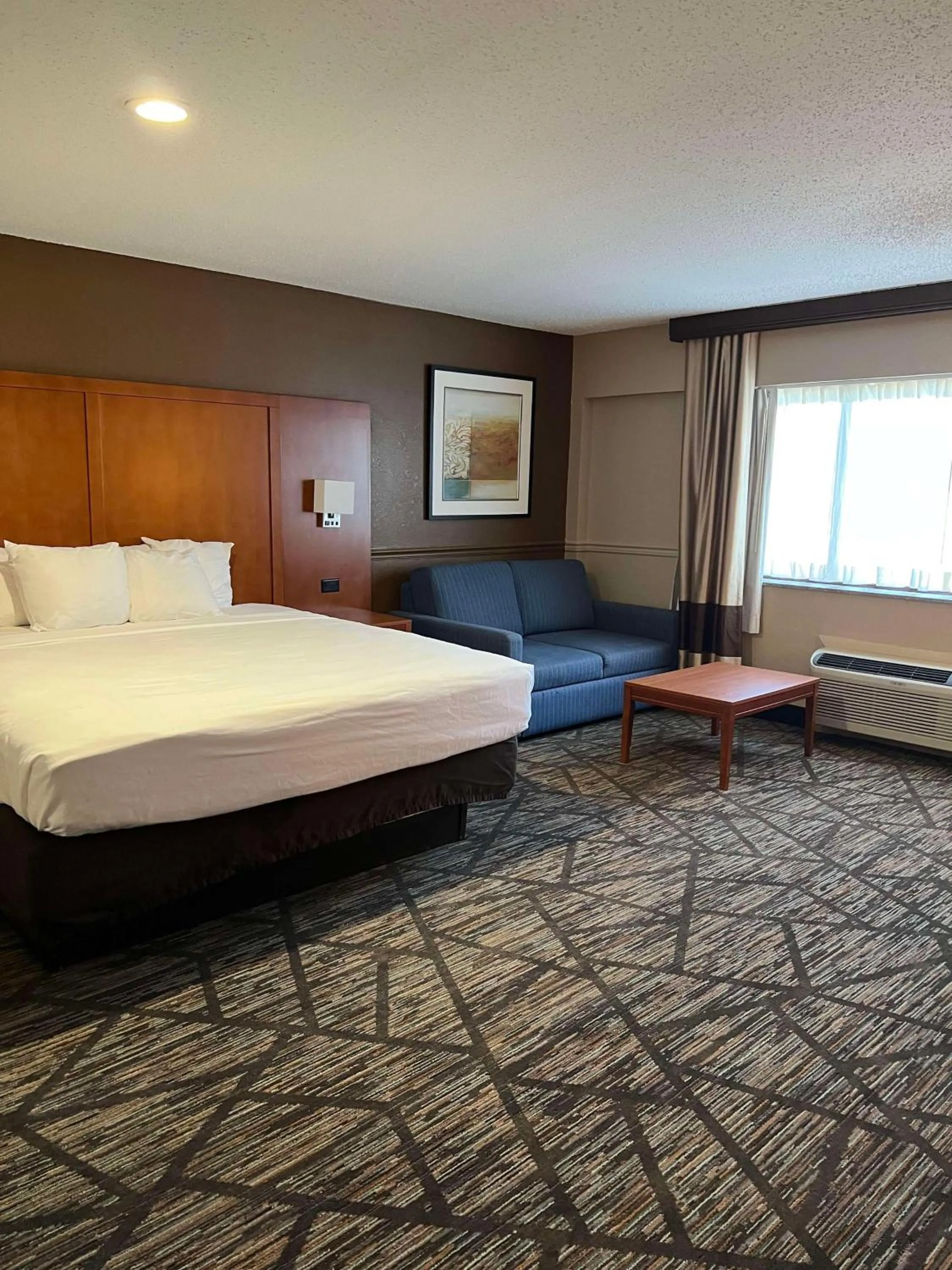 Bedroom in SureStay Plus by Best Western Mobile I-65