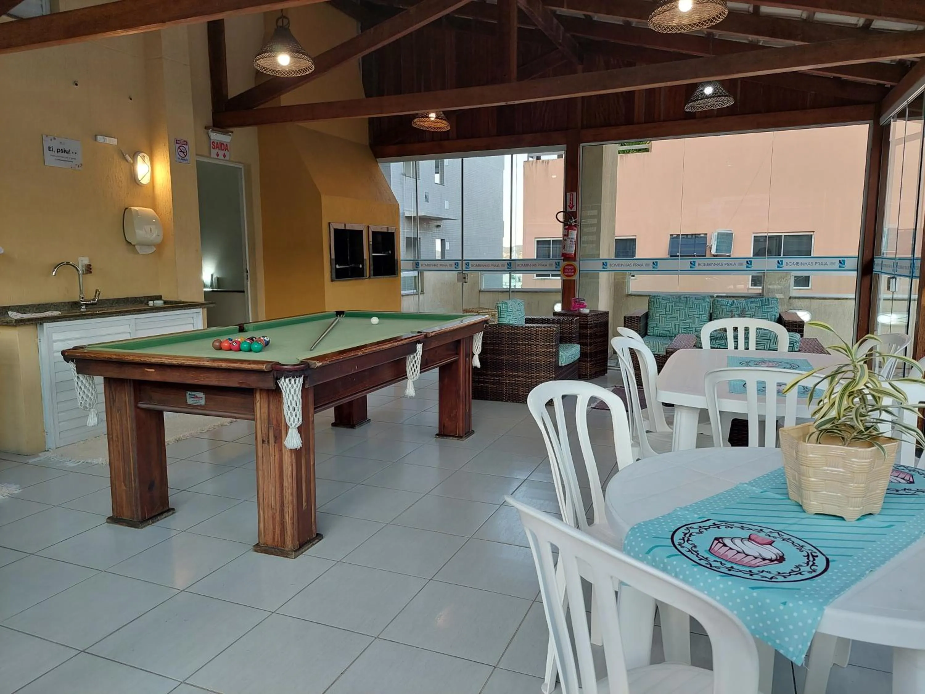 Communal lounge/ TV room in Bombinhas Praia Apart Hotel - unidade rua Bem Te Vi