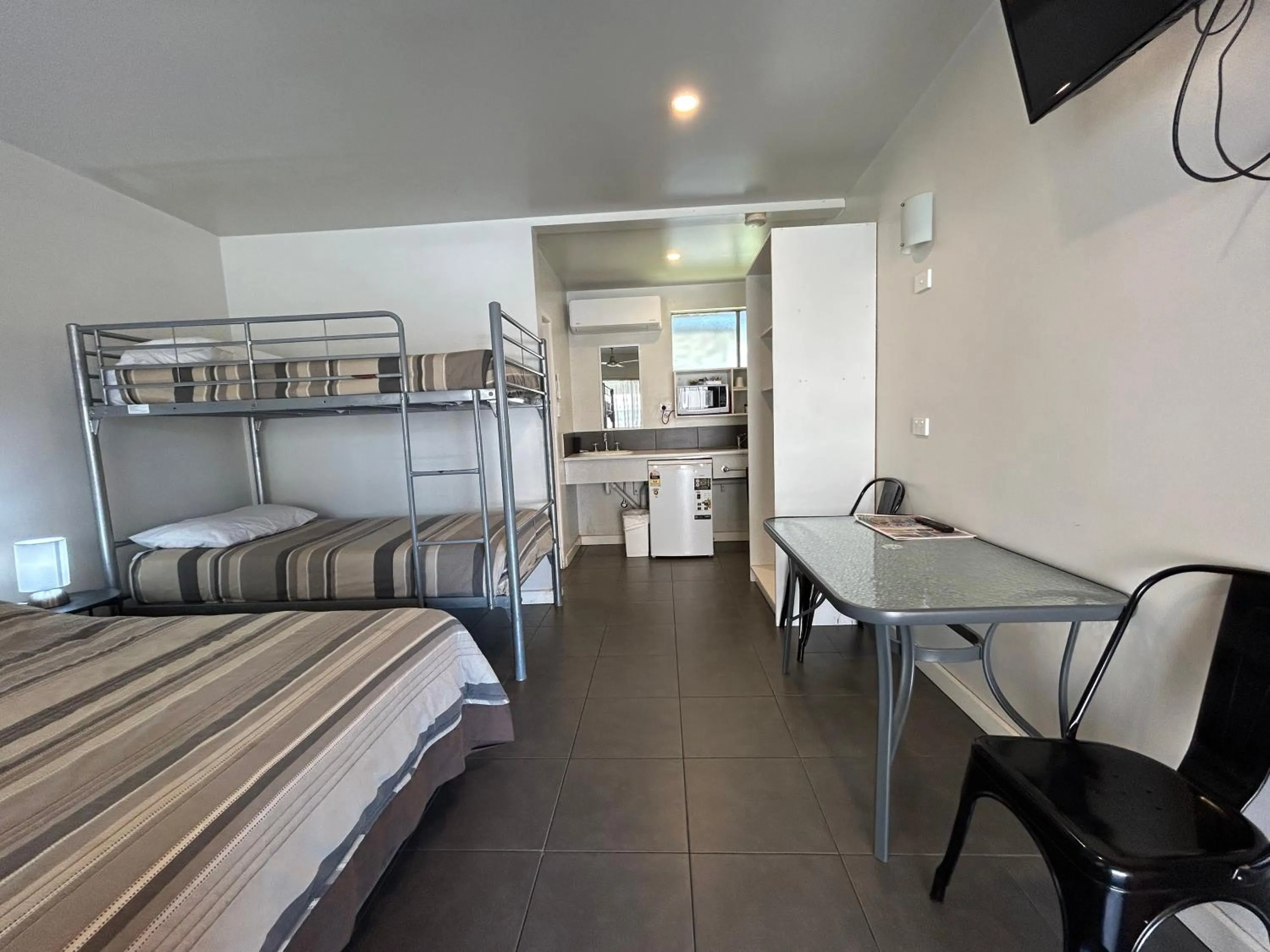 Bed in Tweed River Motel