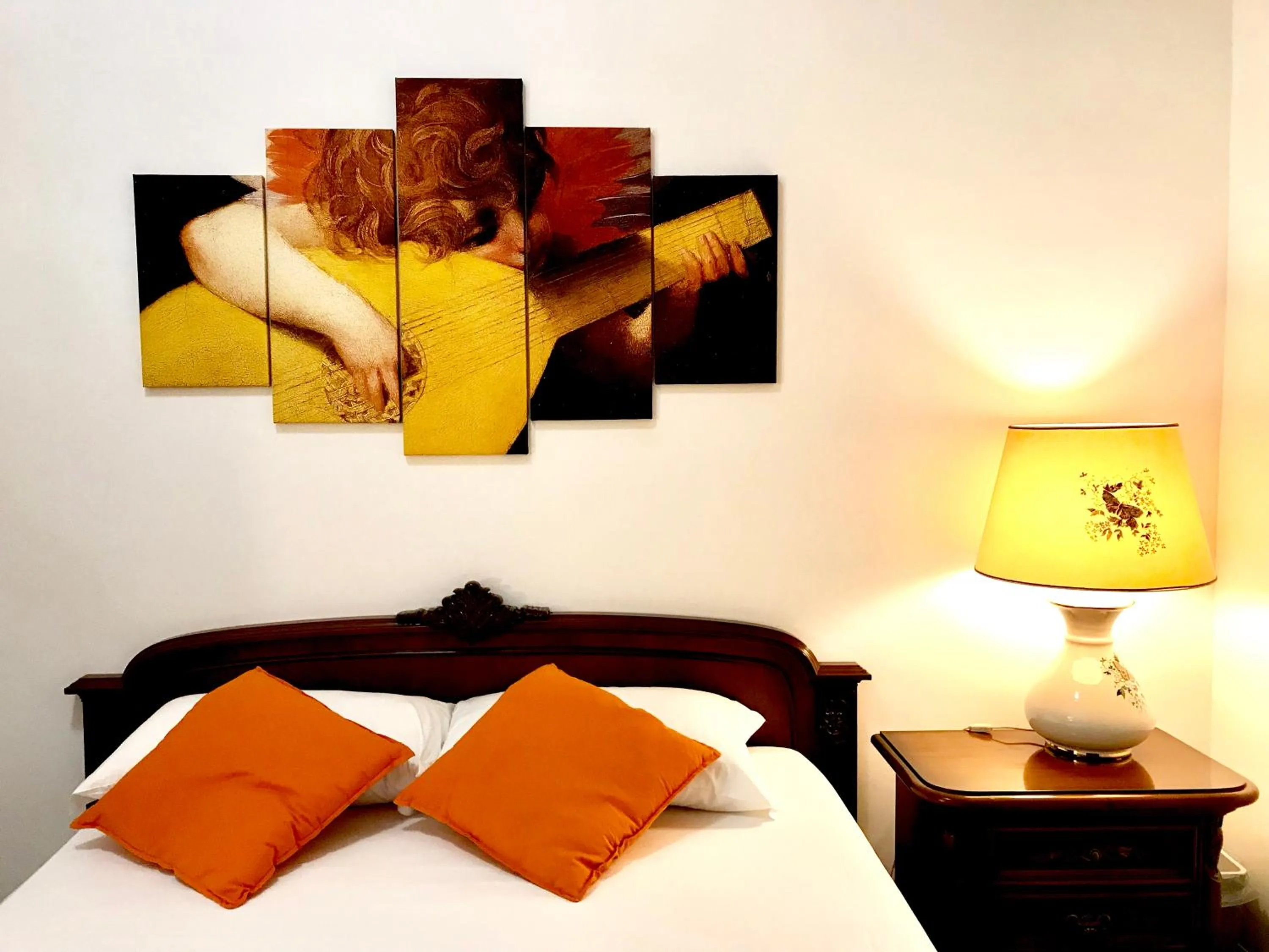 Bed in COLOSSEUM LUXURY ROOM