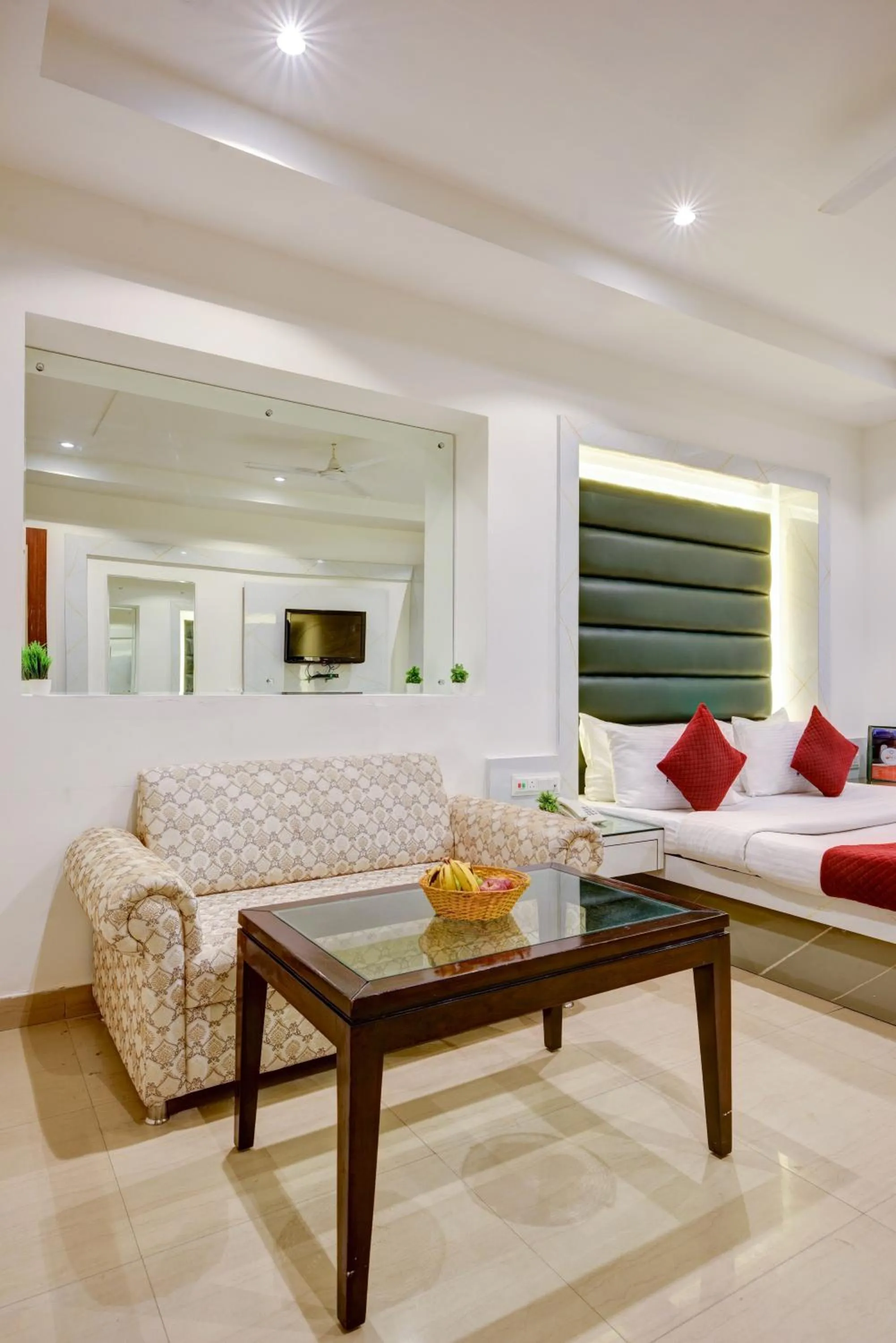 Living room, Bed in Hotel Krishna Deluxe-By RCG Hotels