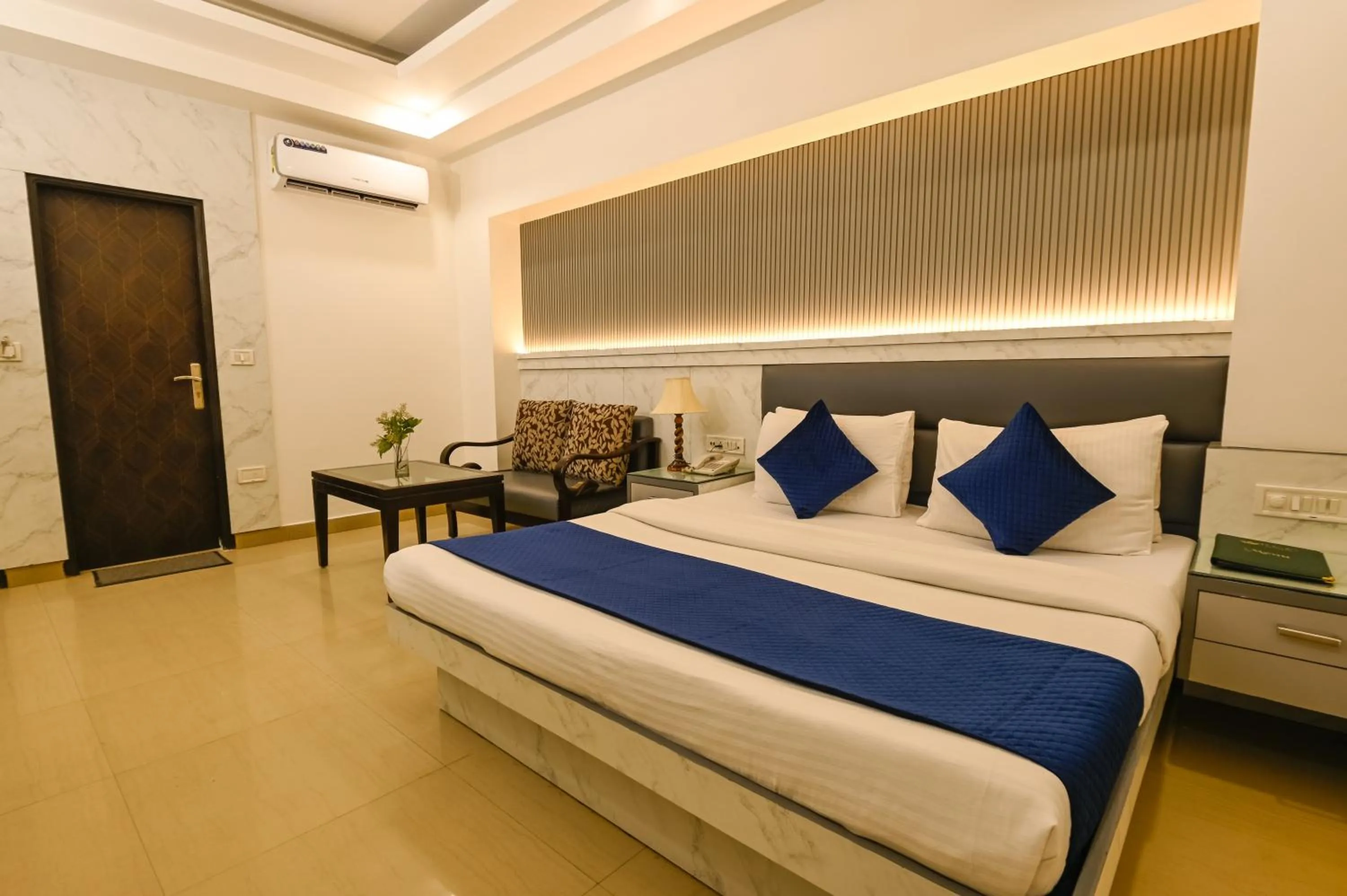 Photo of the whole room, Bed in Hotel Krishna Deluxe-By RCG Hotels
