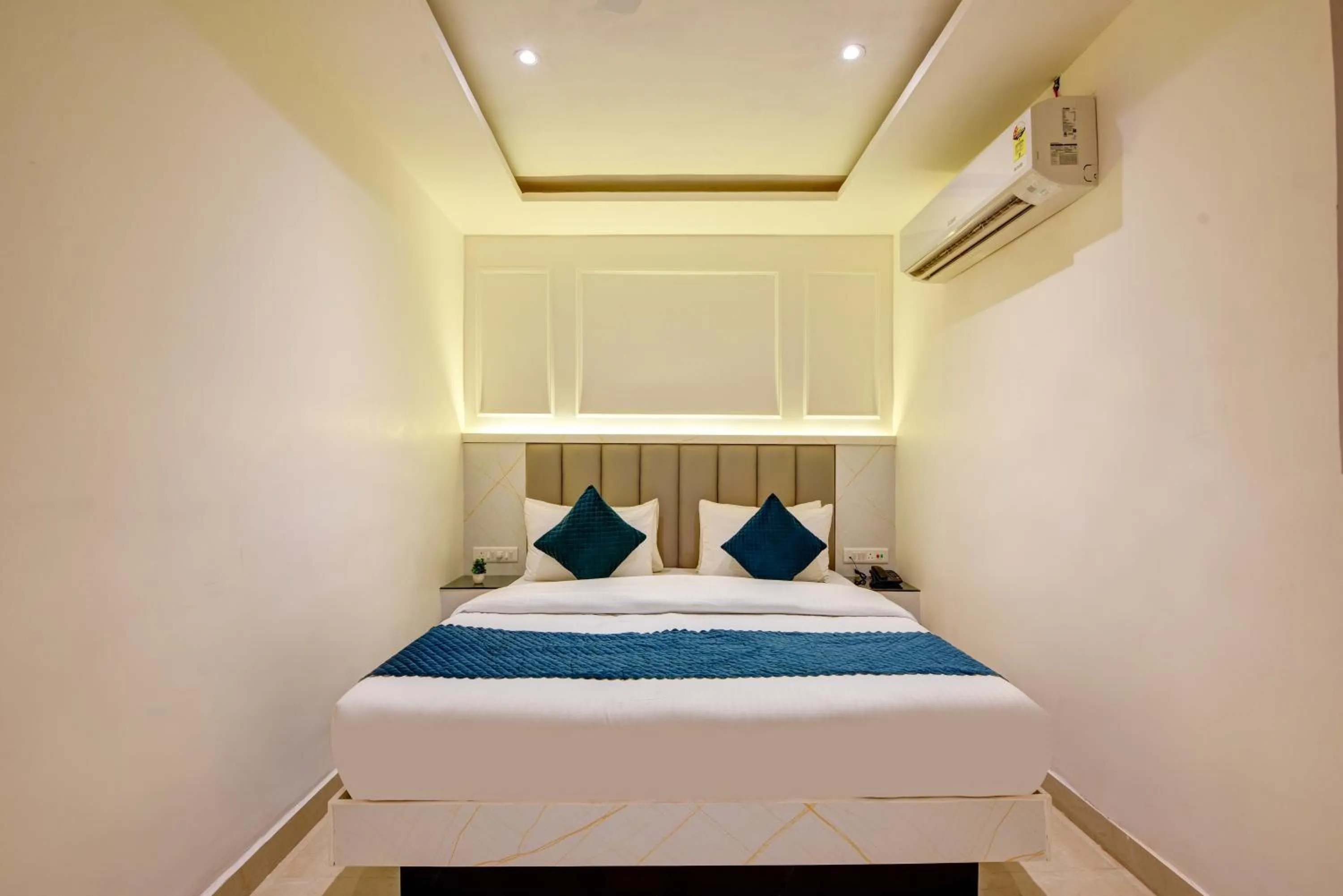 Bedroom, Bed in Hotel Krishna Deluxe-By RCG Hotels