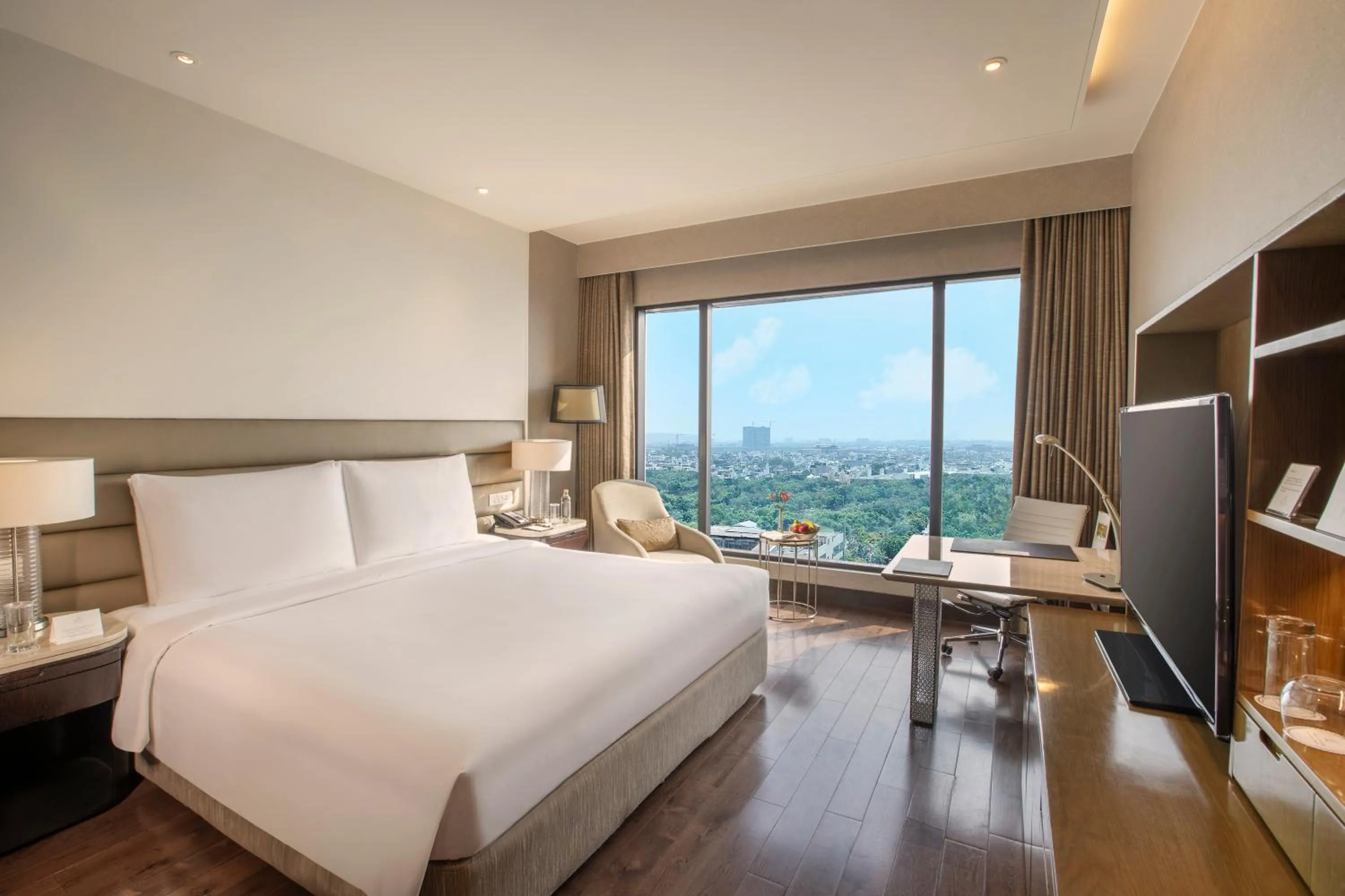 Bed in The Leela Ambience Convention Hotel Delhi