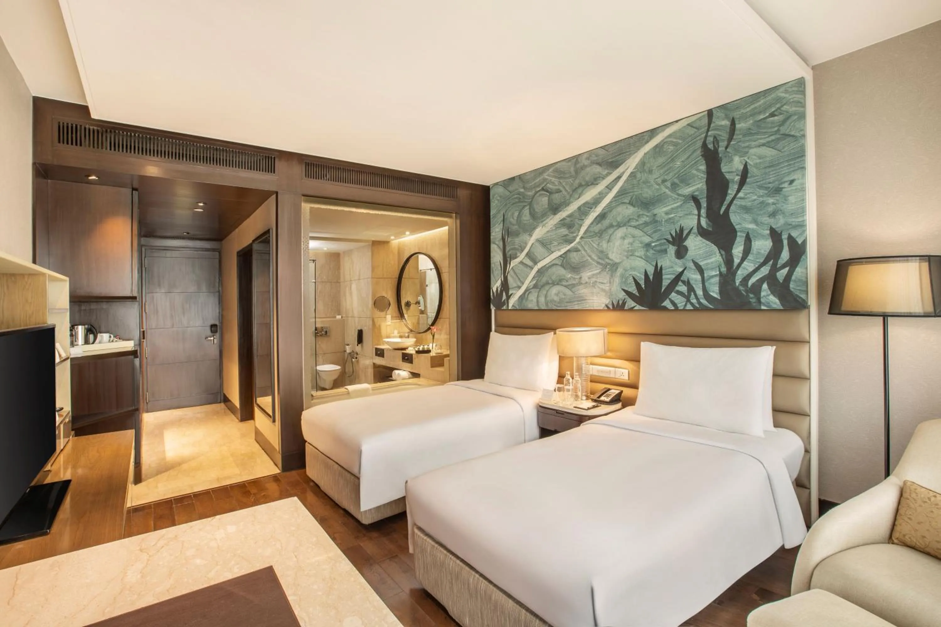 Bed in The Leela Ambience Convention Hotel Delhi