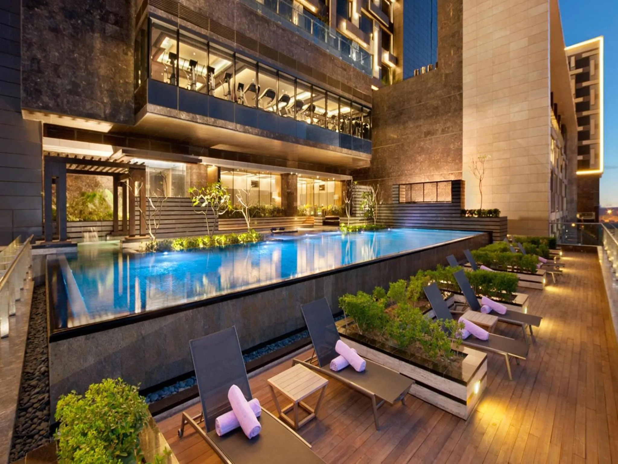 Swimming pool in The Leela Ambience Convention Hotel Delhi