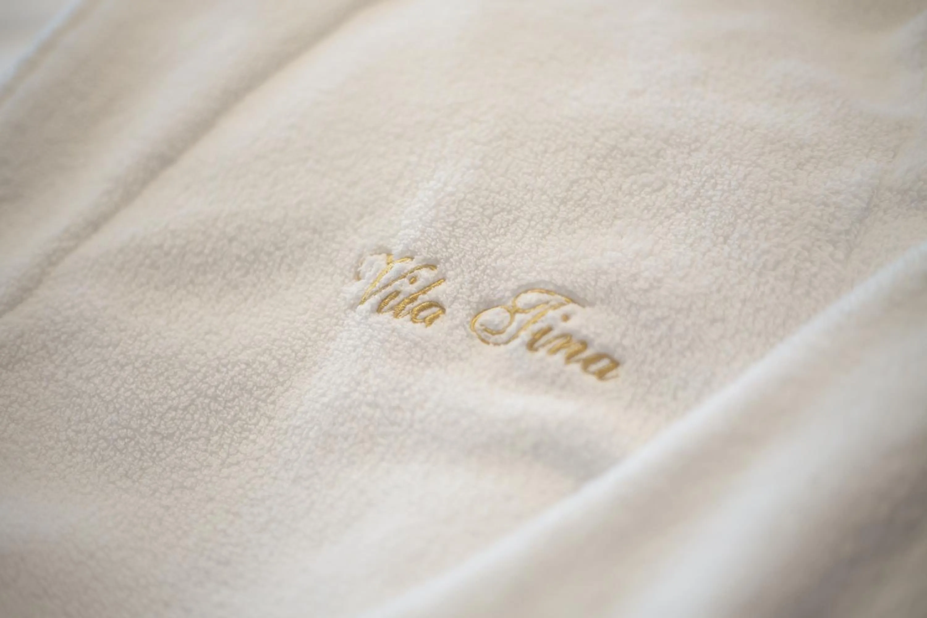 Logo/Certificate/Sign in Hotel Vila Tina