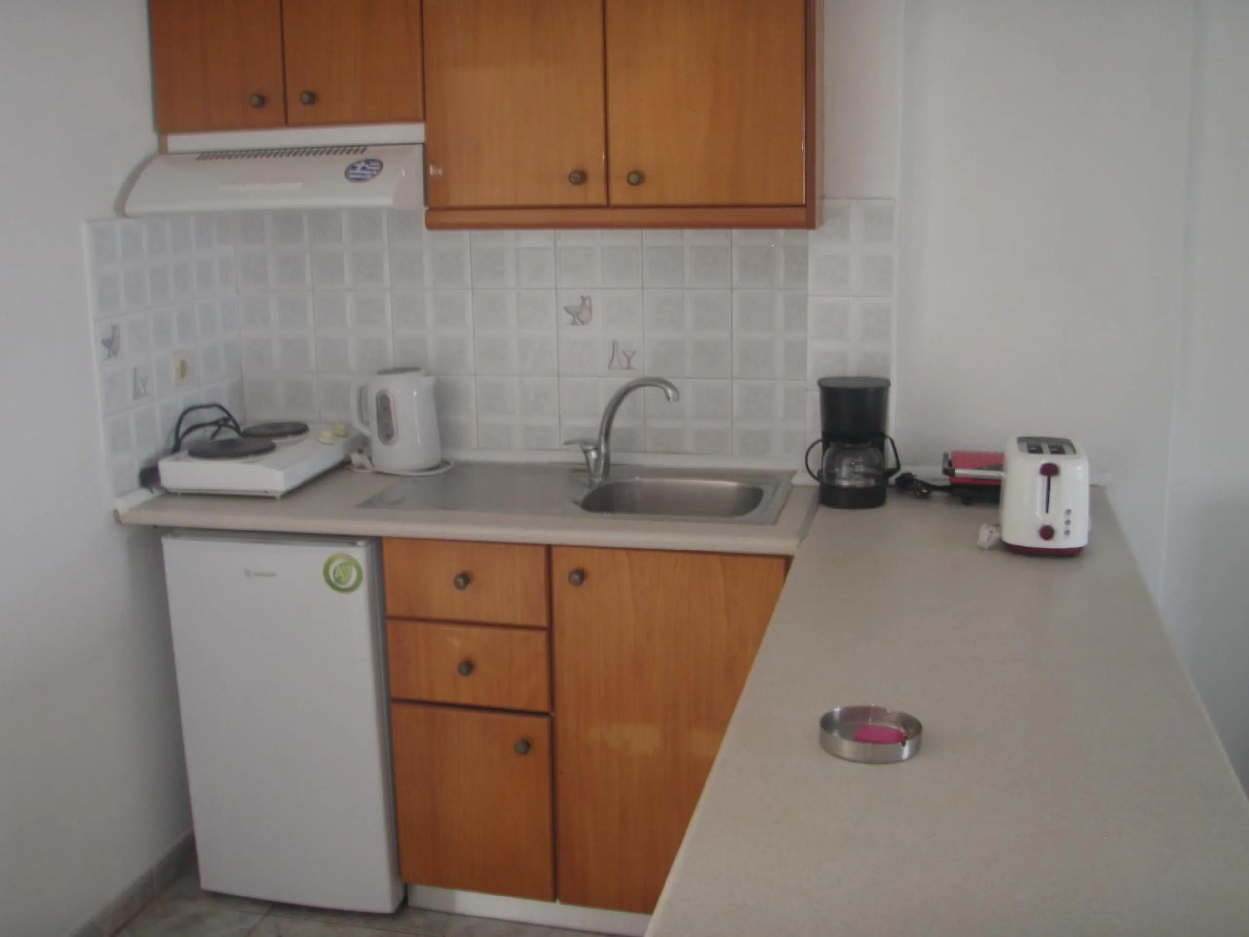 Kitchen or kitchenette in UMBRELLA BEACH APARTMENTs