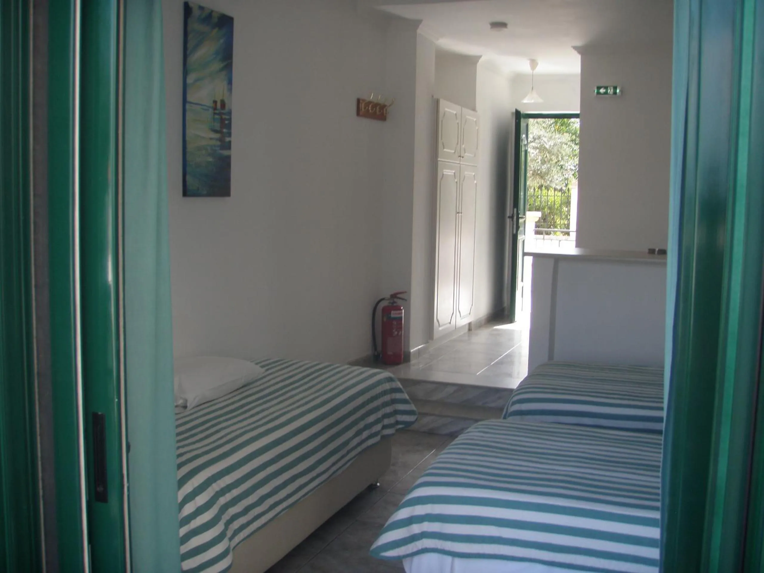 Bedroom, Bed in UMBRELLA BEACH APARTMENTs