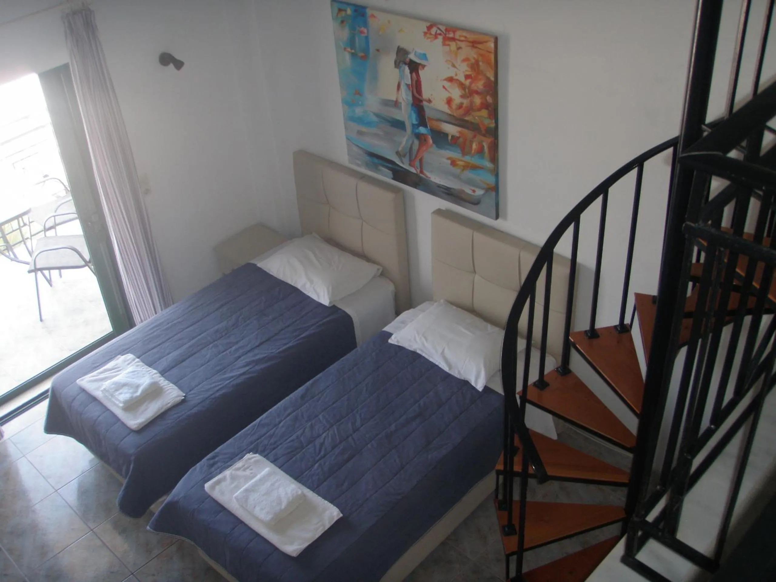 Photo of the whole room, Bed in UMBRELLA BEACH APARTMENTs