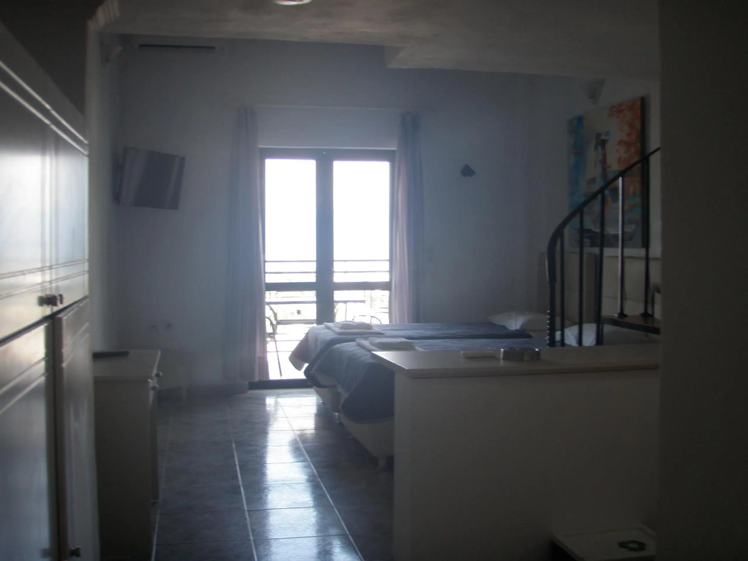 Photo of the whole room, Bed in UMBRELLA BEACH APARTMENTs