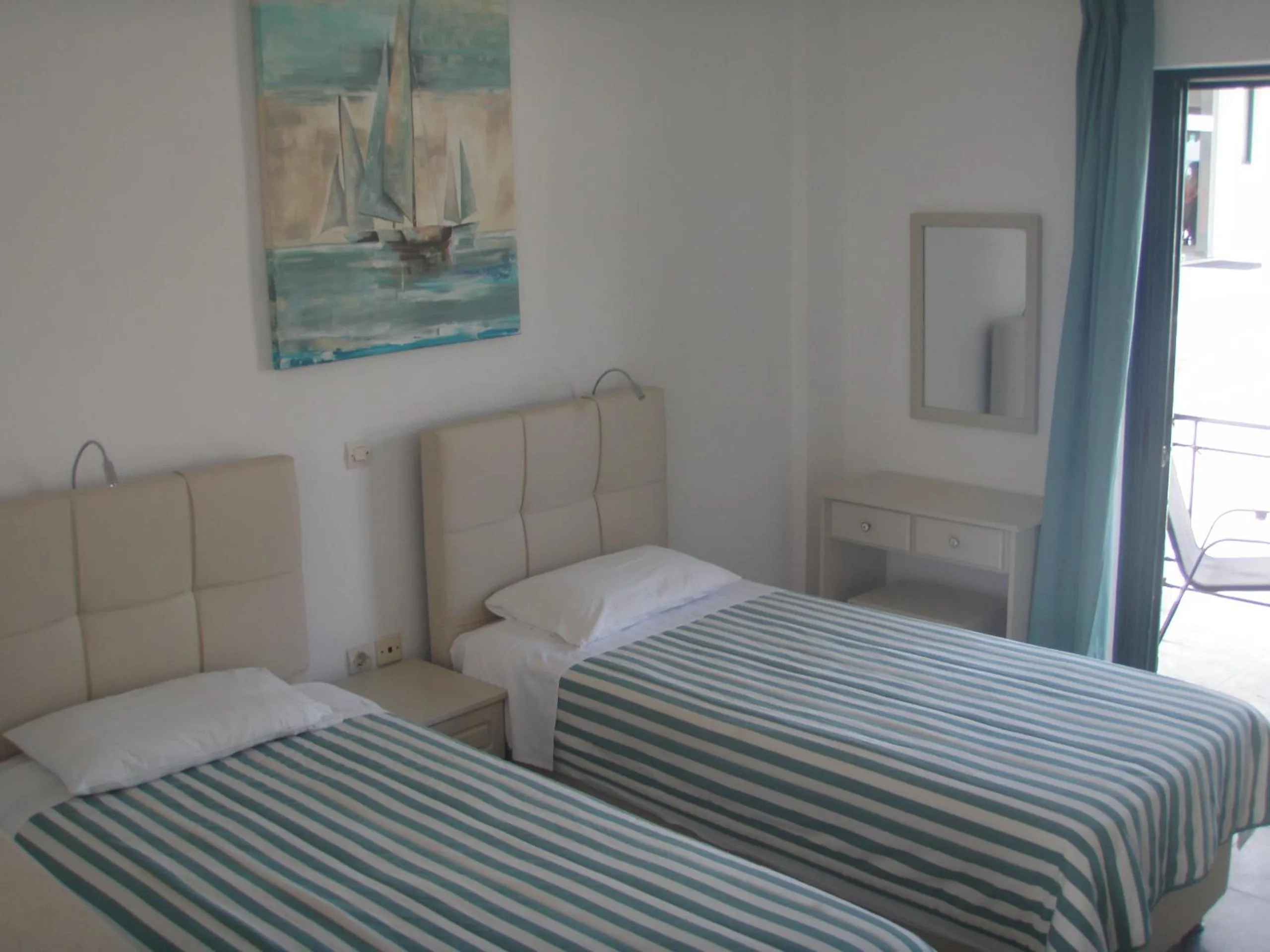 Bedroom, Bed in UMBRELLA BEACH APARTMENTs