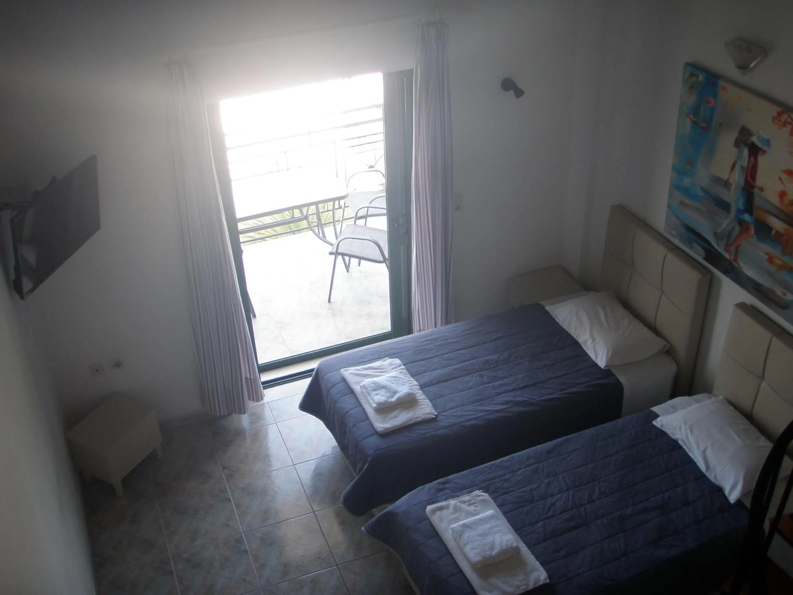 Photo of the whole room, Bed in UMBRELLA BEACH APARTMENTs
