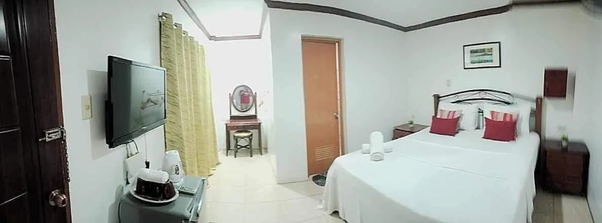 Bed in Double Diamond Inn Guest House