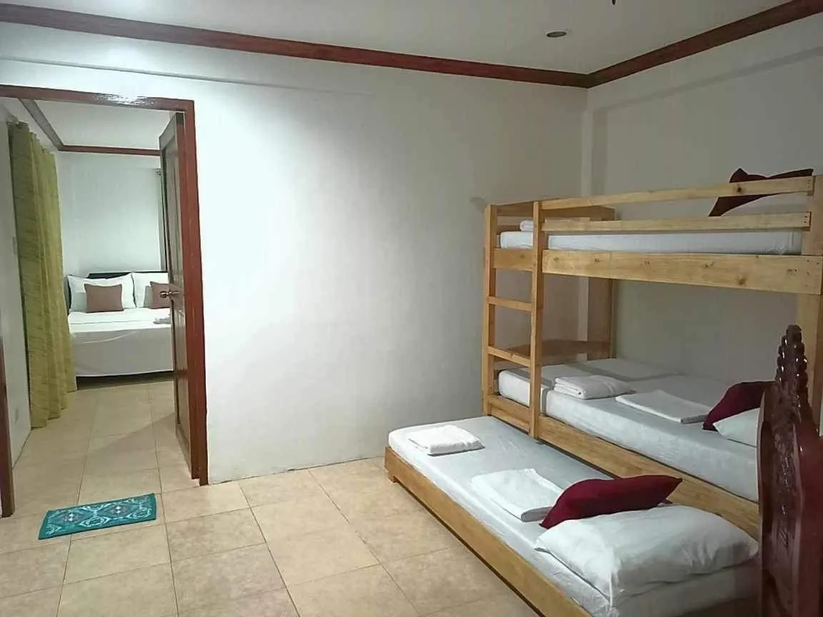 Bed in Double Diamond Inn Guest House