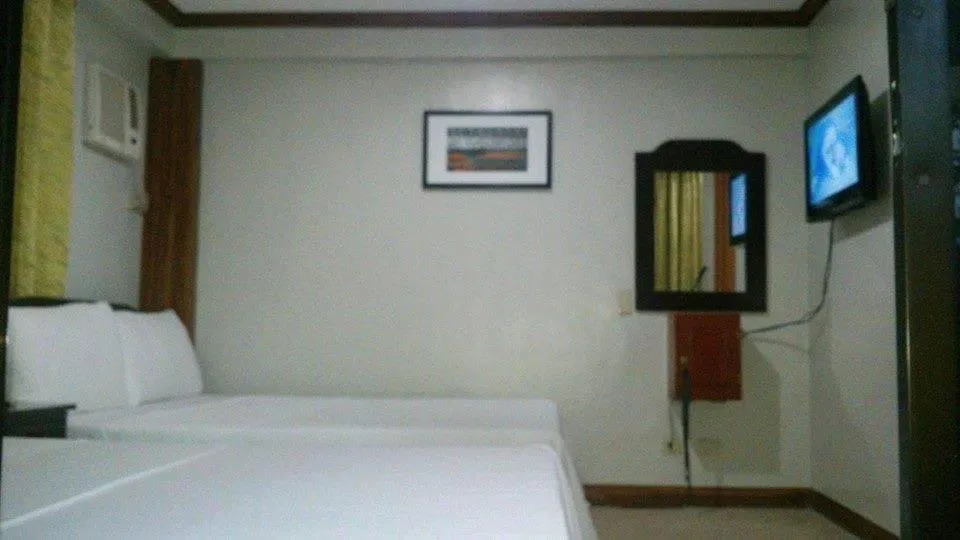 Bed in Double Diamond Inn Guest House