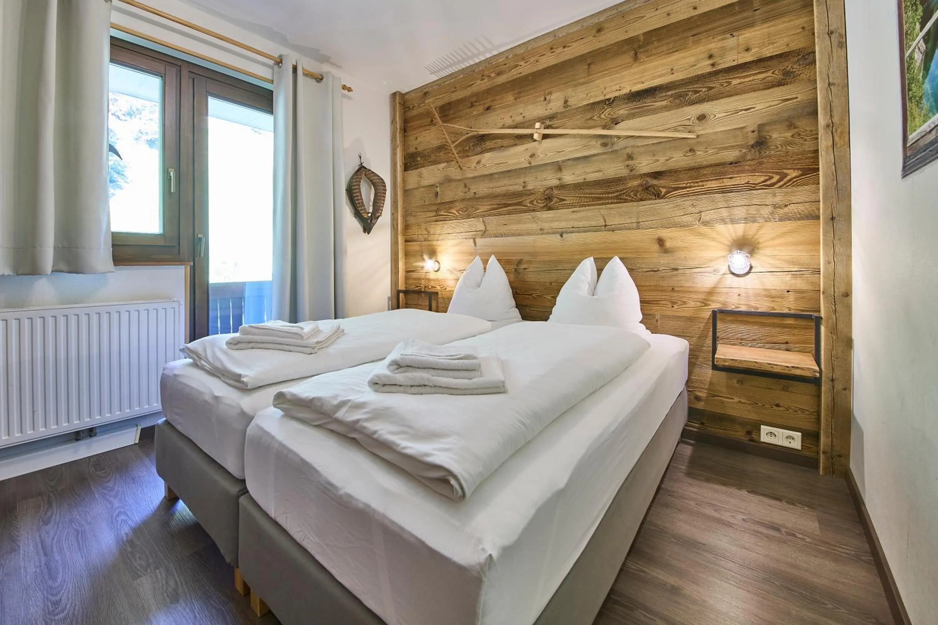 Bed in Apartments Enzian