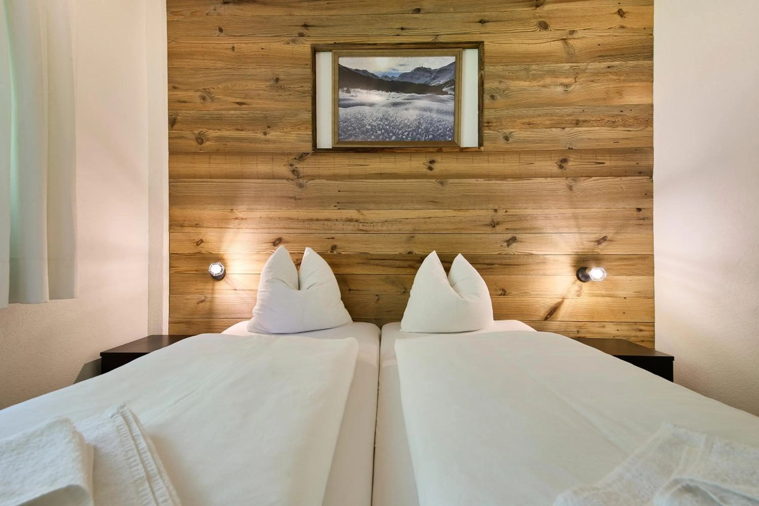 Bed in Apartments Enzian