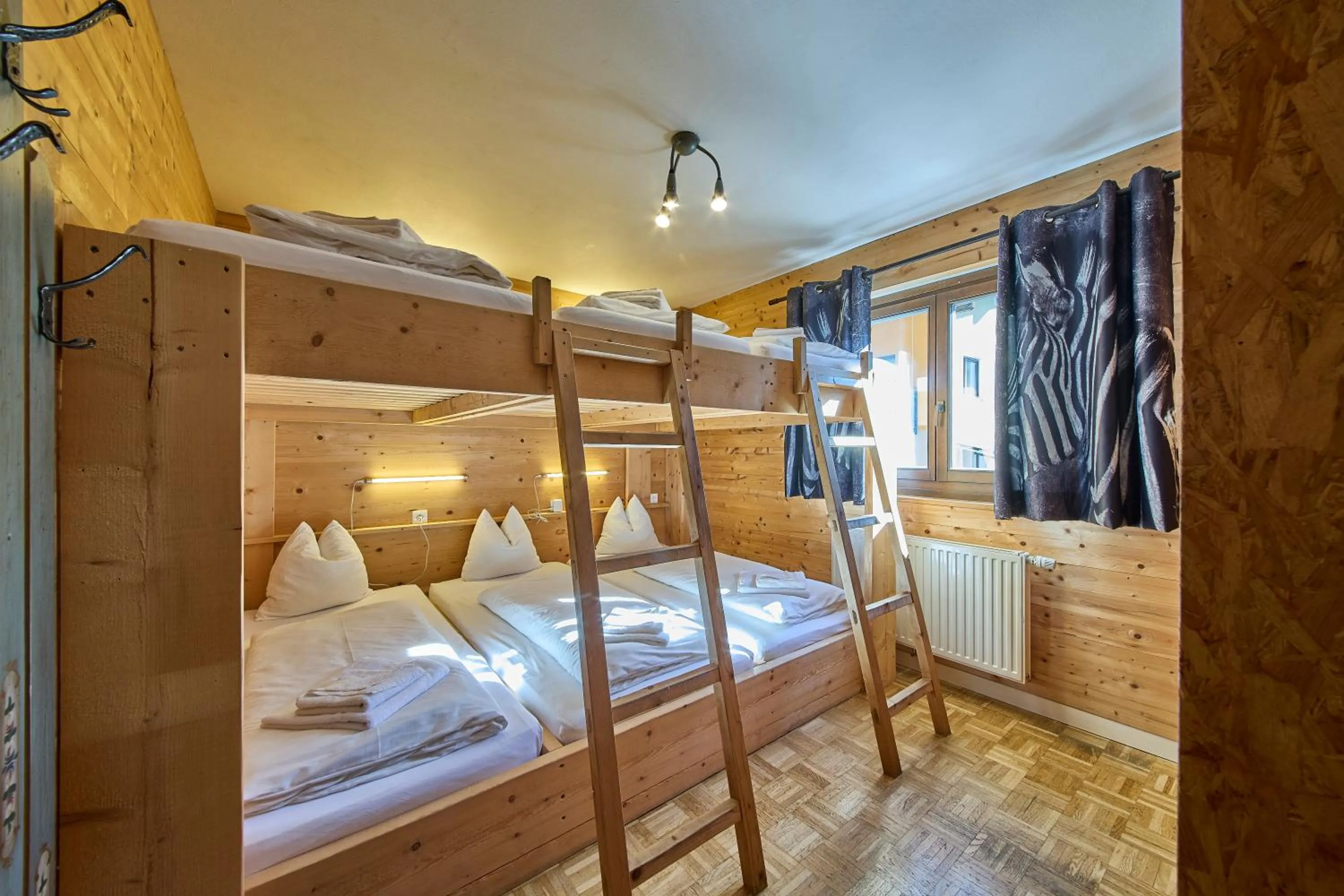 Bed in Apartments Enzian