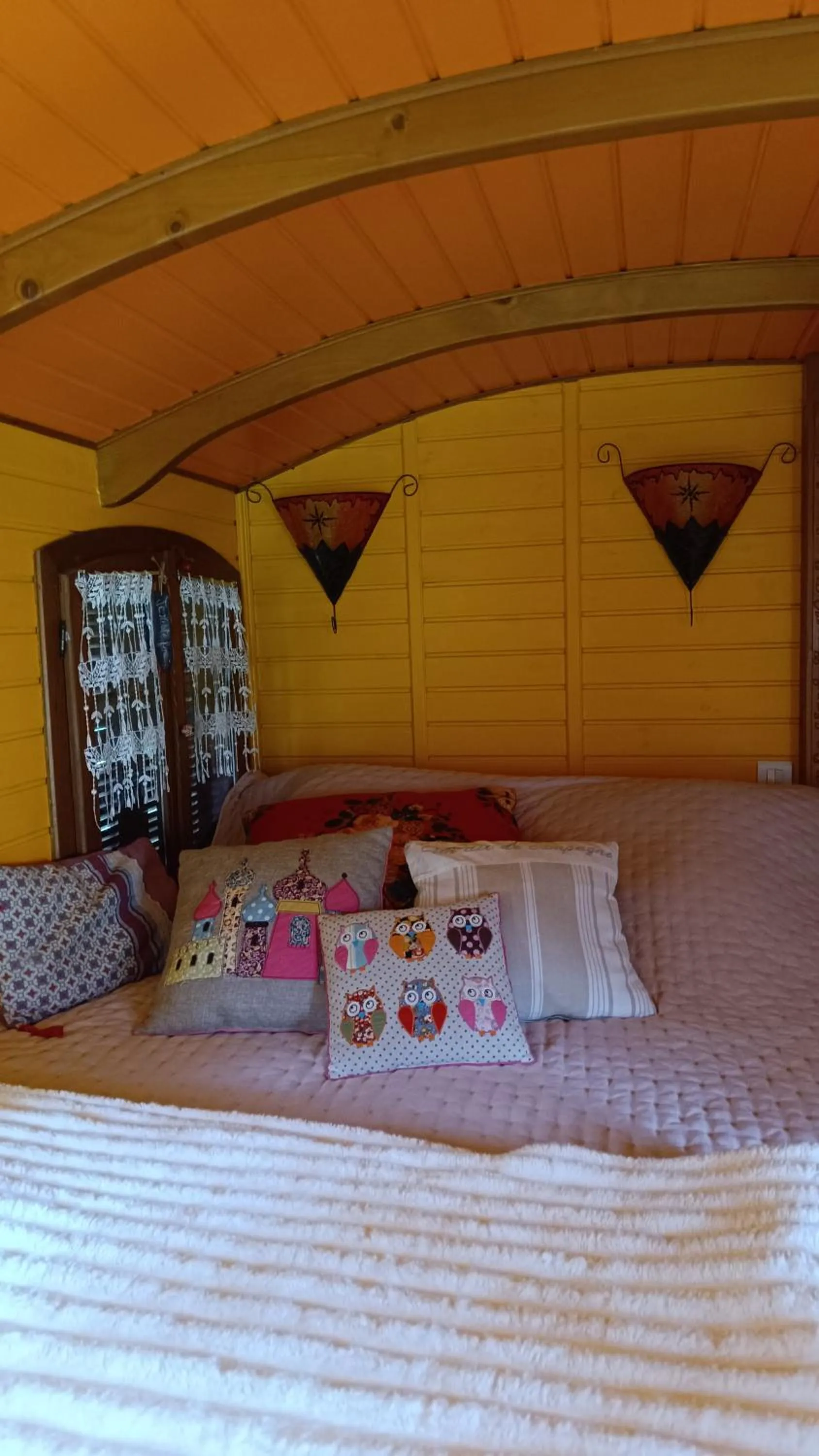 Bed in La Clé des Roulottes