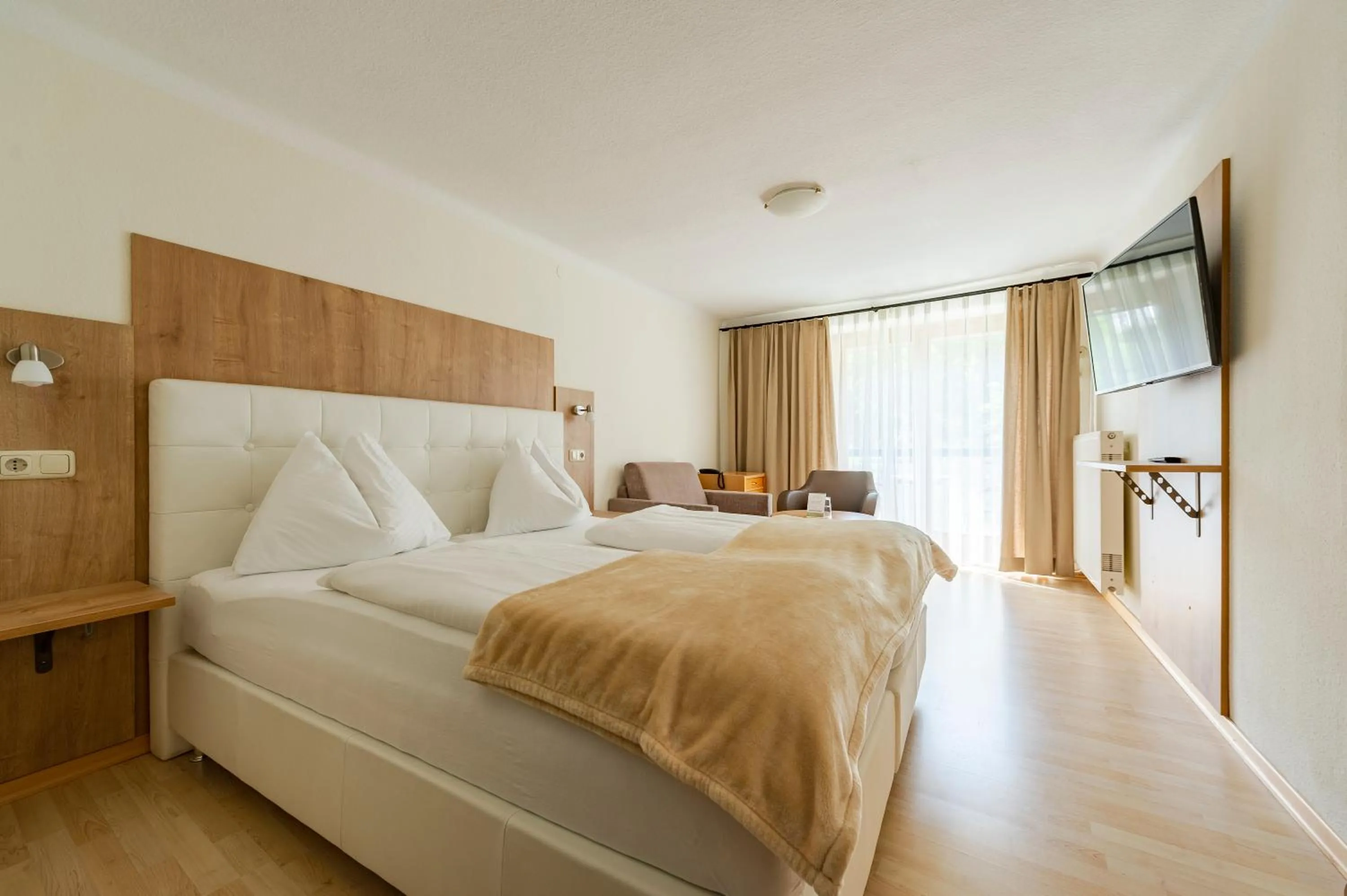 Photo of the whole room, Bed in Der Thaller - Wirtshaus - Restaurant - Hotel