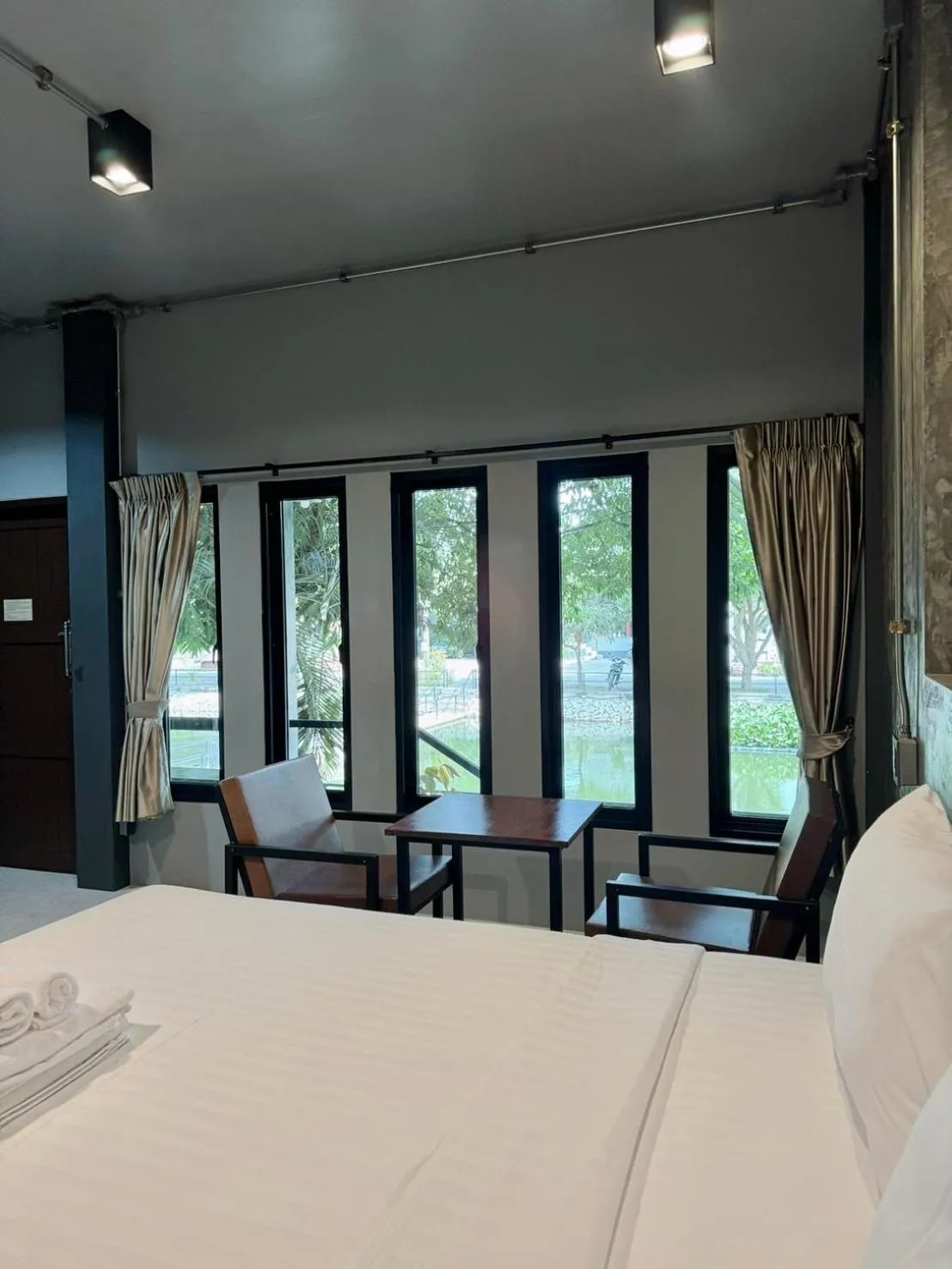 Photo of the whole room, Bed in Midtown Sukhothai