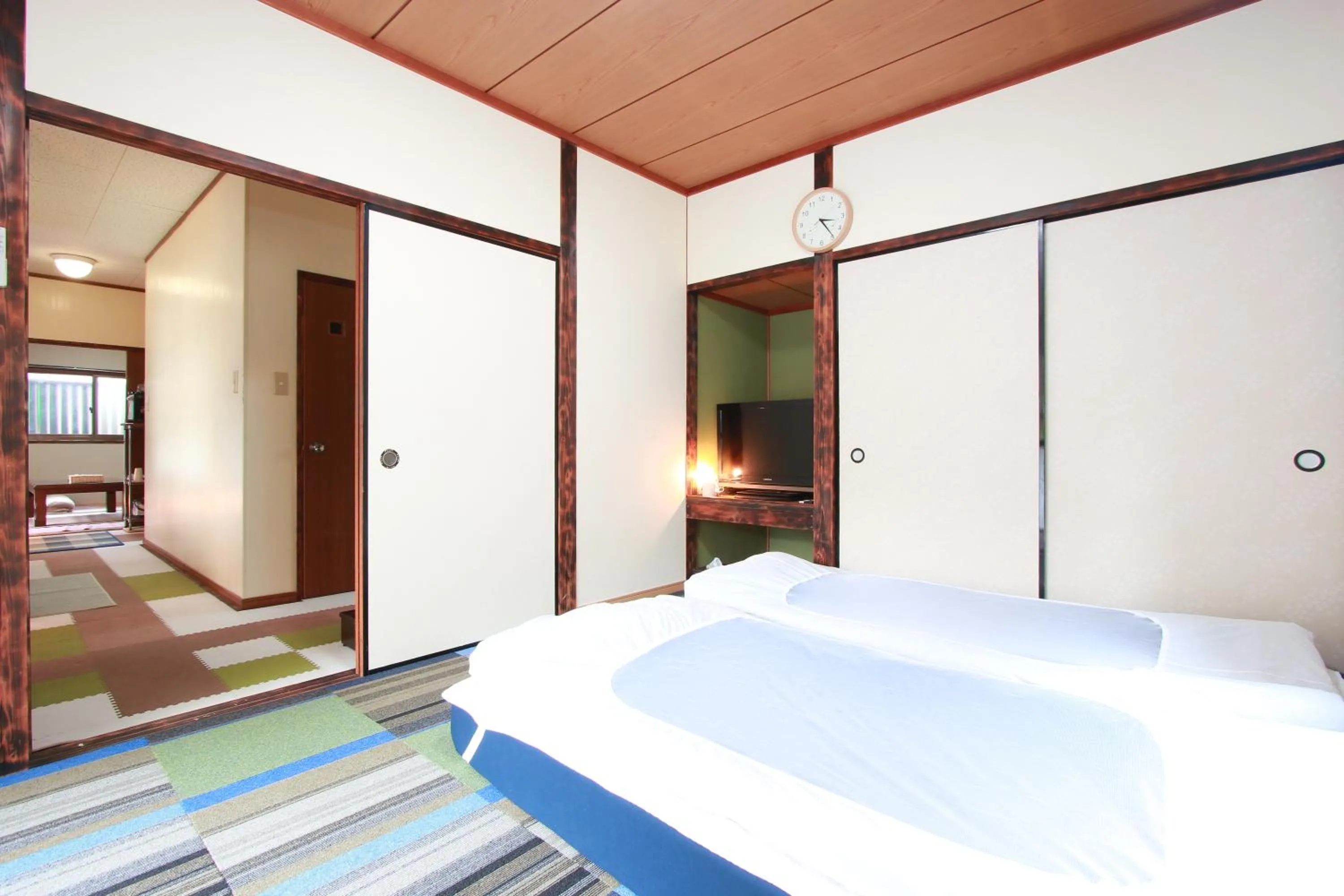 Bed in Ramune Onsen Senju no Sato