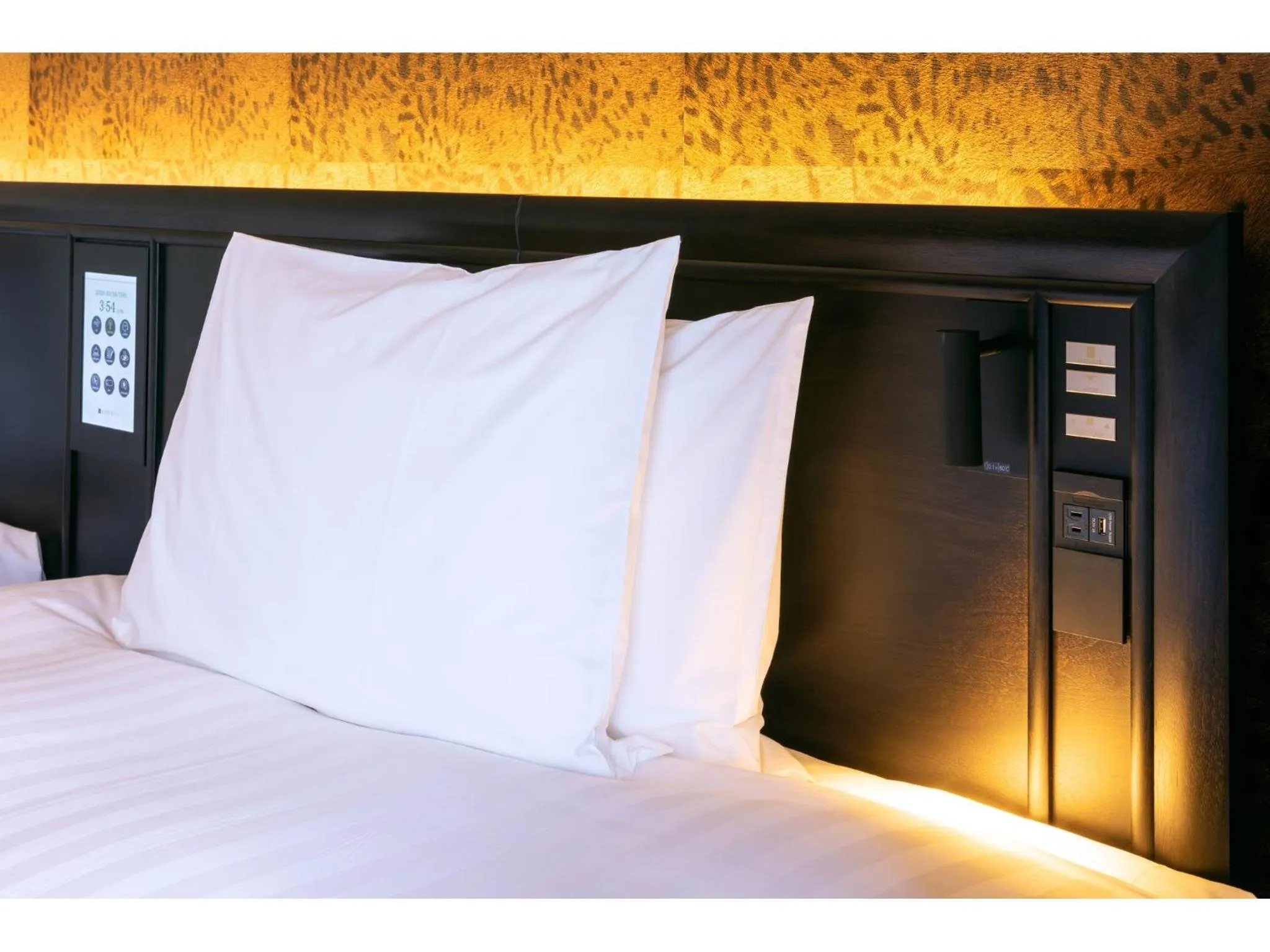 Bed in LIBER HOTEL Osaka