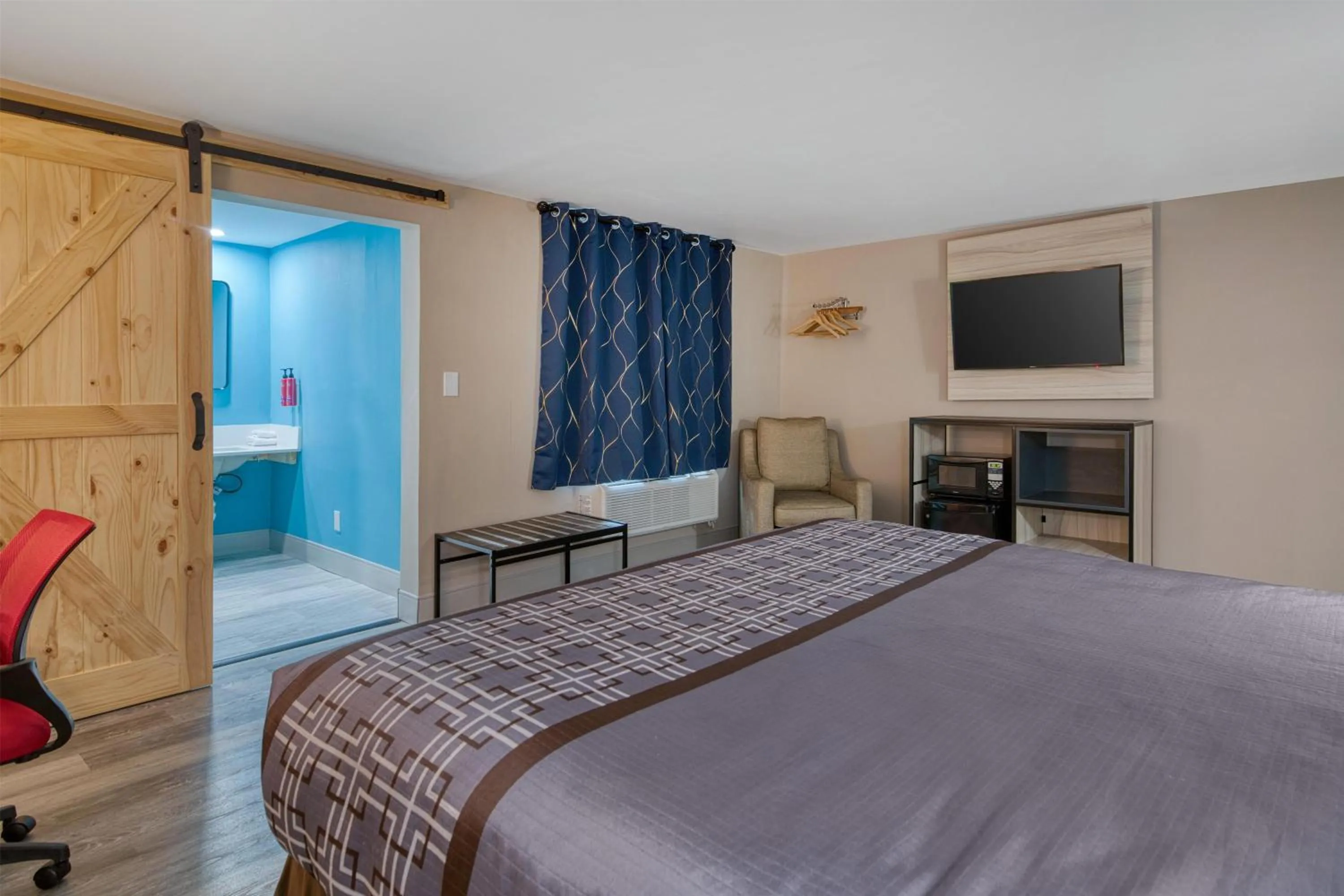 Bedroom, Bed in Yankee Clipper Inn, SureStay Collection by Best Western