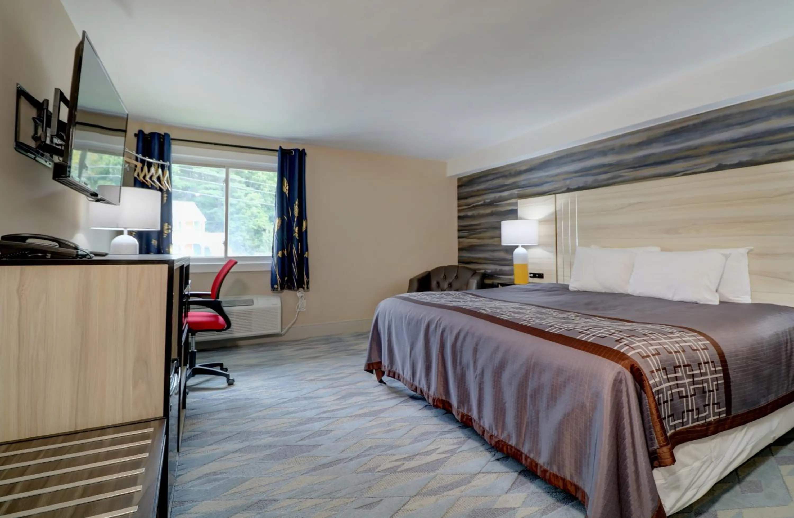 Bed in Yankee Clipper Inn, SureStay Collection by Best Western