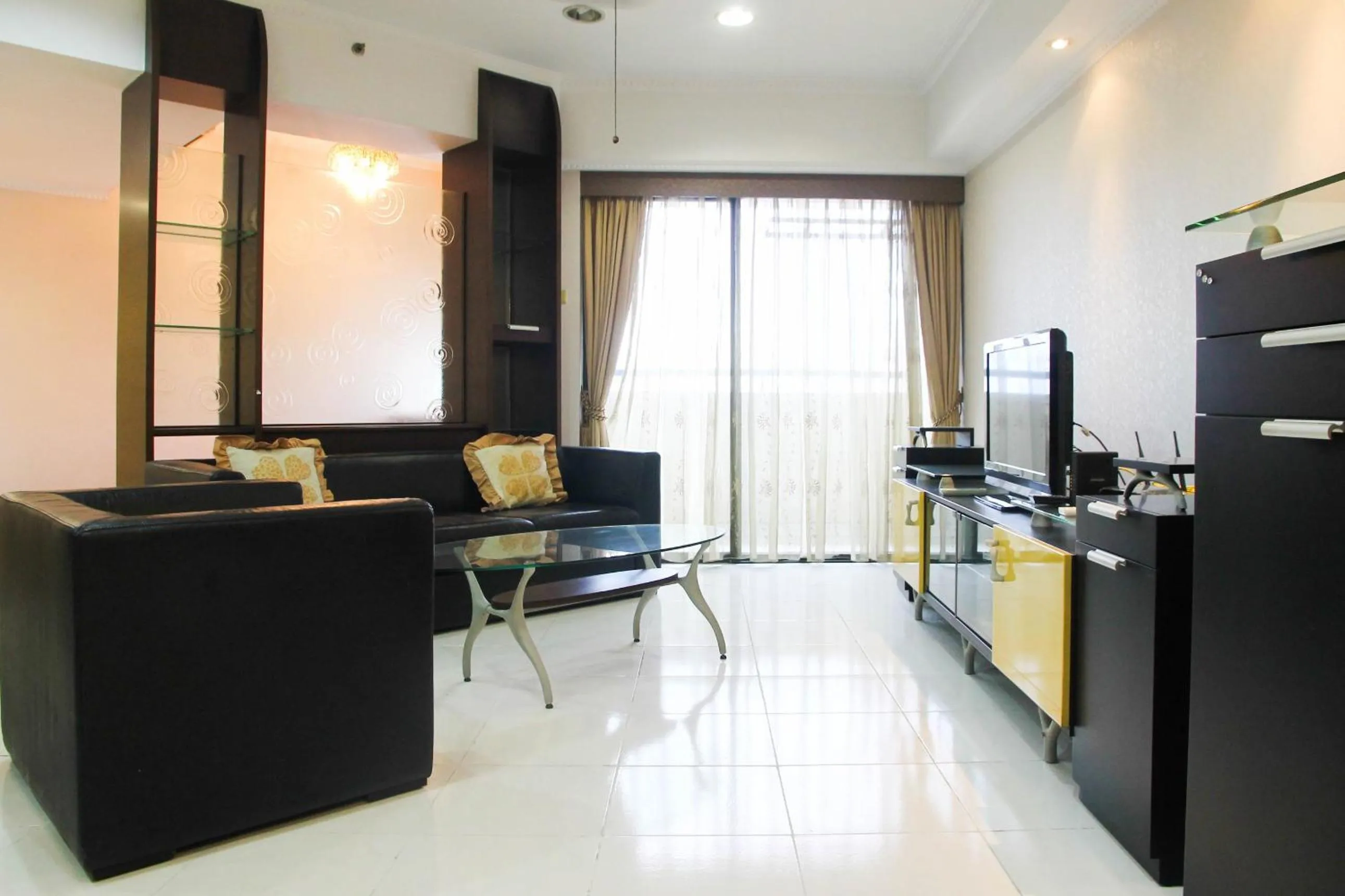 Photo of the whole room in 2BR Family Sudirman Tower Condominium Apartment near Plaza Semanggi By Travelio