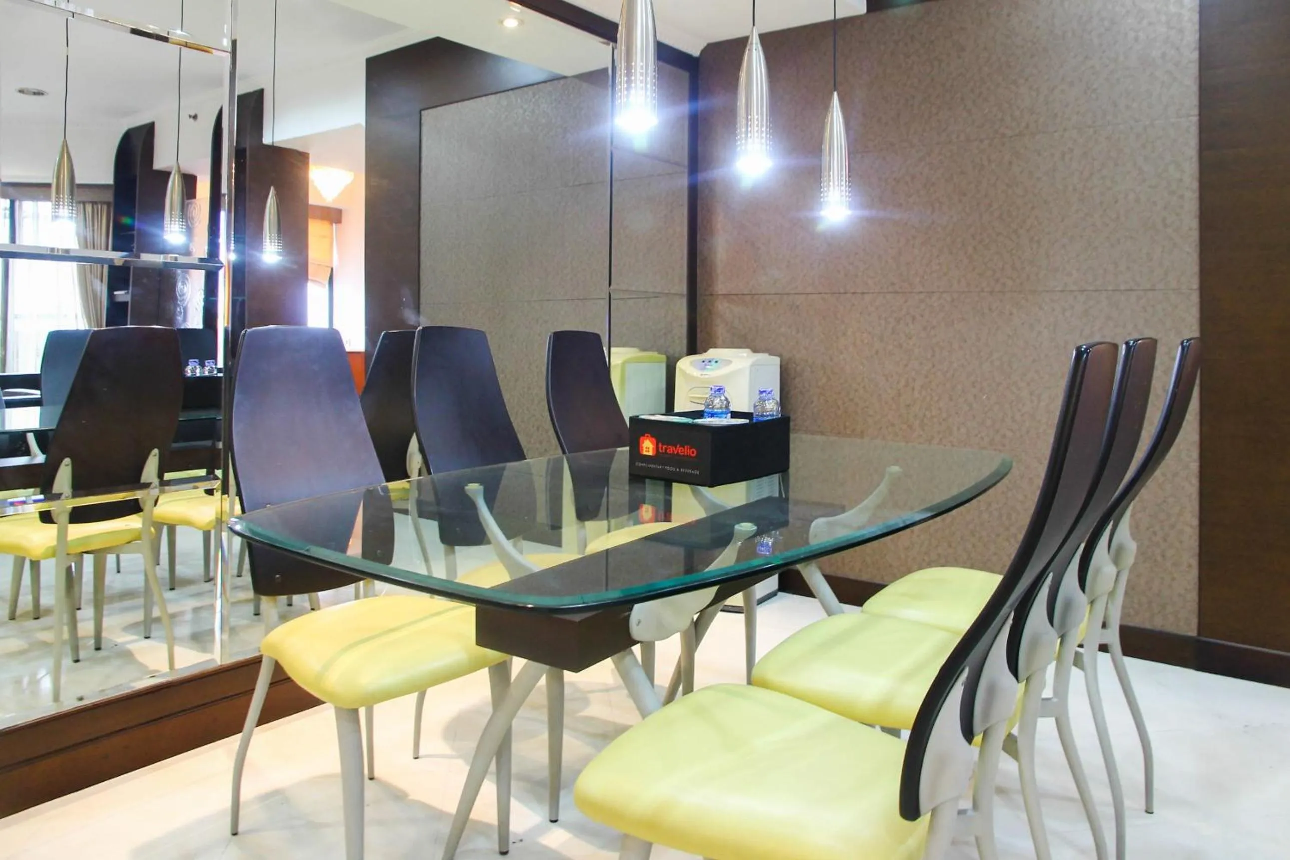 Dining area in 2BR Family Sudirman Tower Condominium Apartment near Plaza Semanggi By Travelio