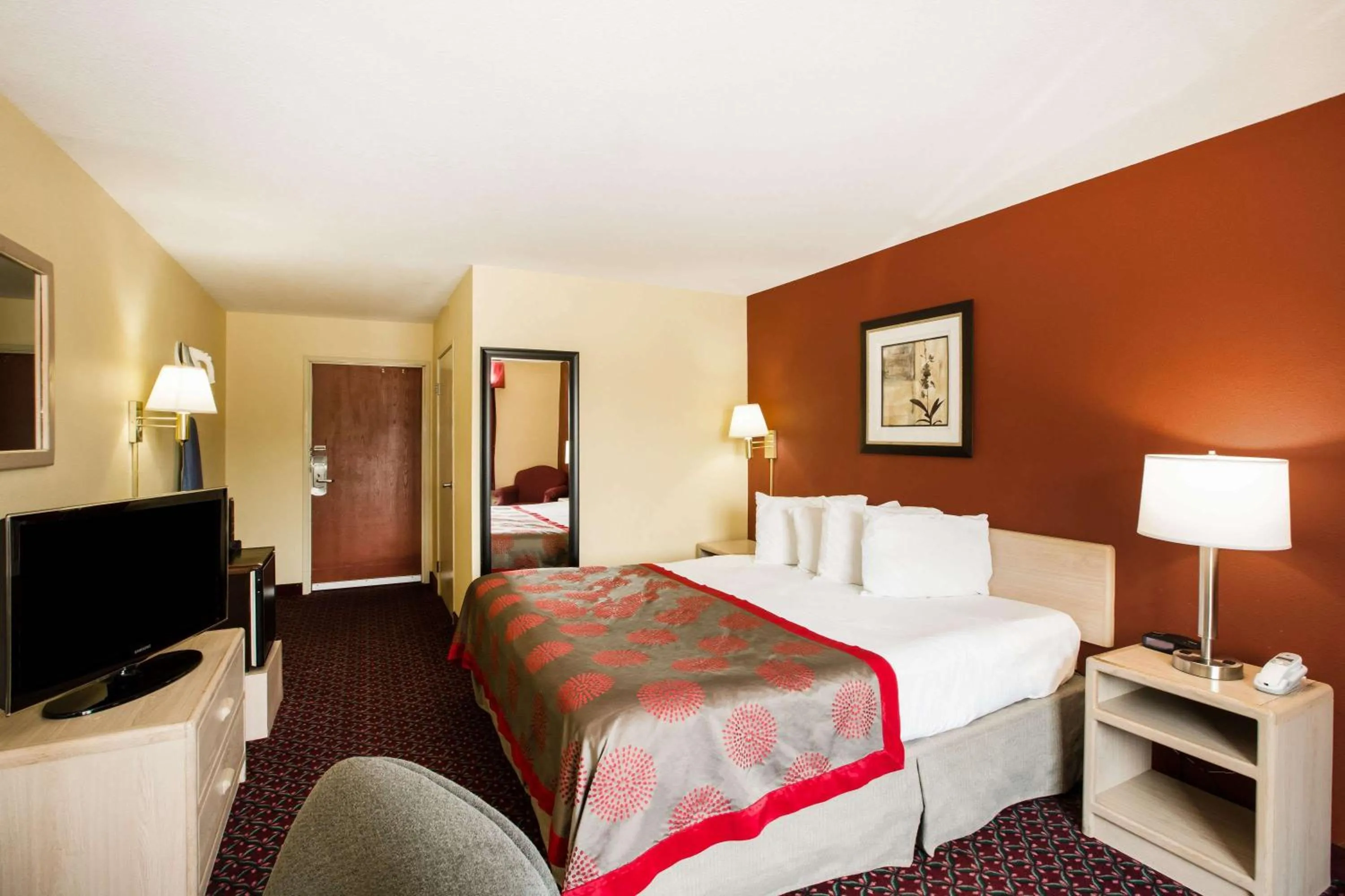 Photo of the whole room, Bed in Ramada by Wyndham Sioux Falls