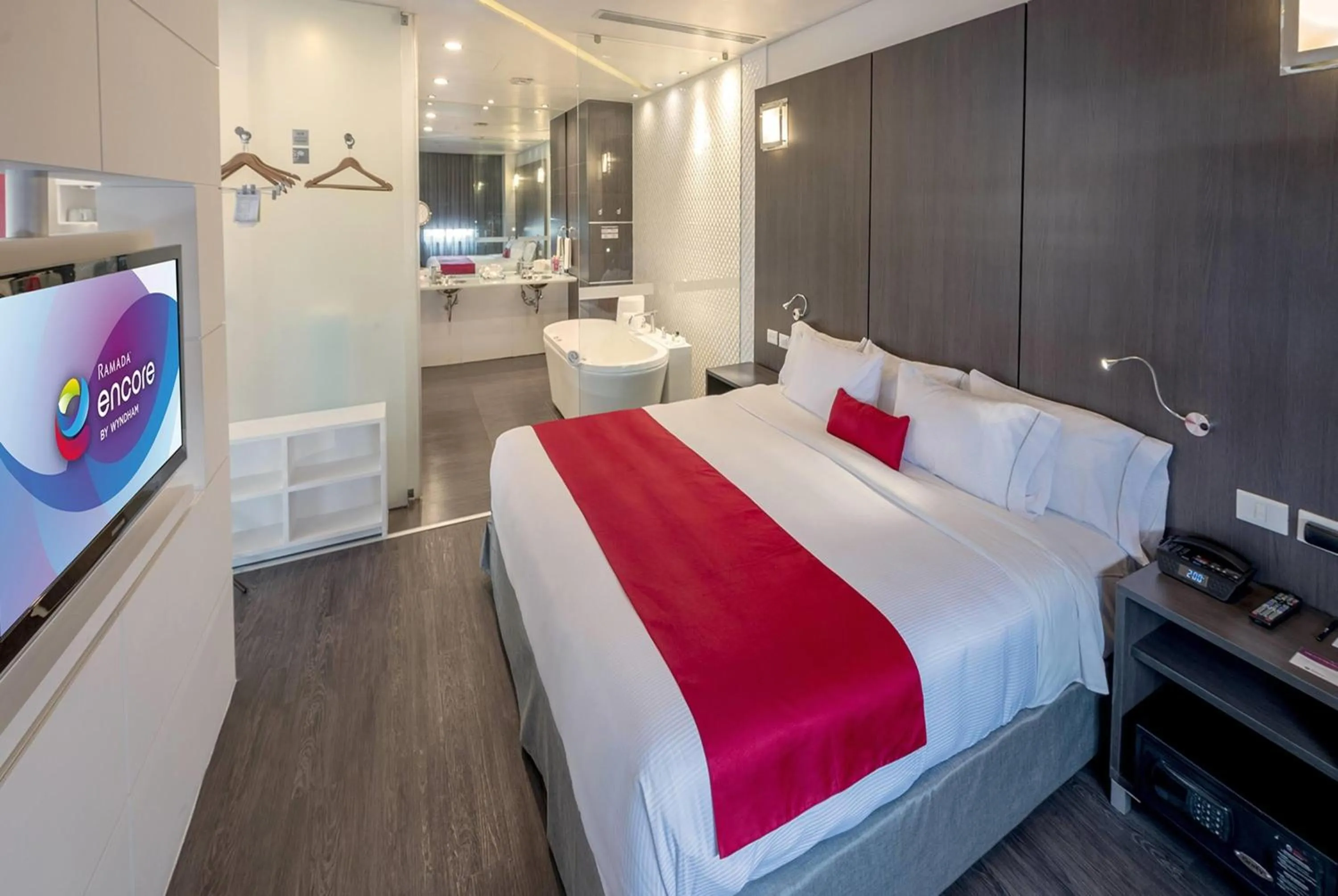 Photo of the whole room, Bed in Ramada Encore by Wyndham Guadalajara Sur