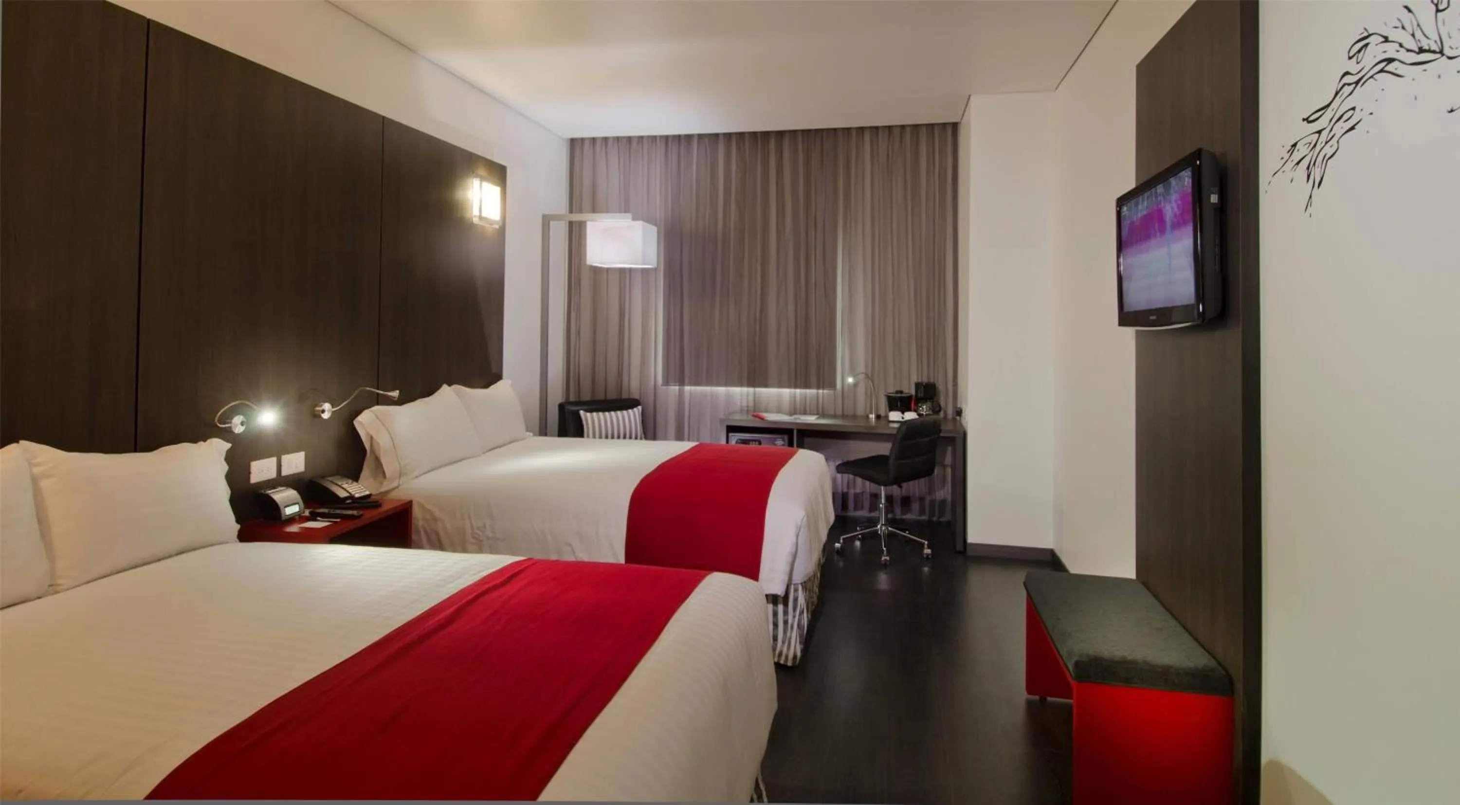 Photo of the whole room, Bed in Ramada Encore by Wyndham Guadalajara Sur