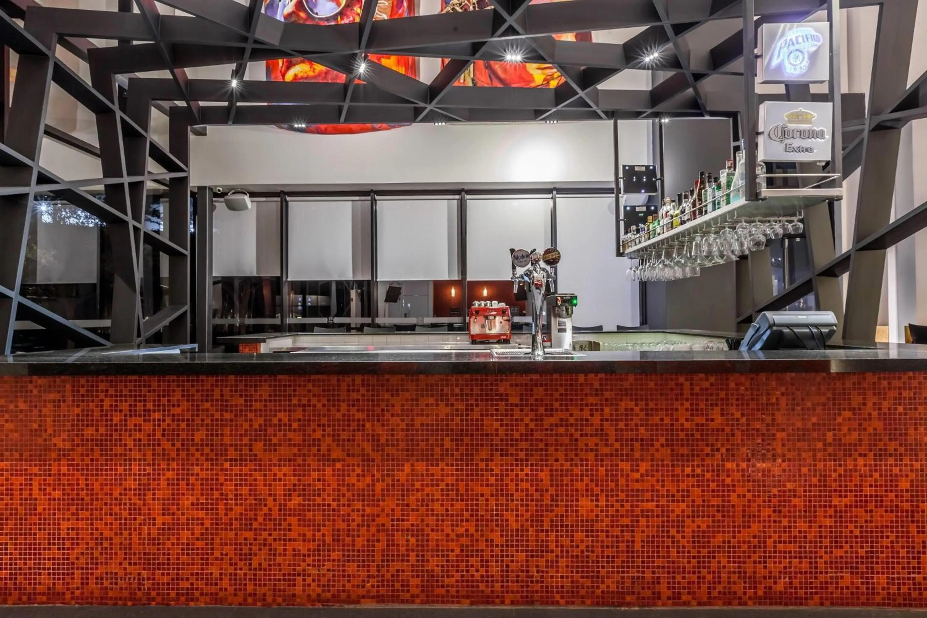 Lounge or bar in Ramada Encore by Wyndham Guadalajara Sur