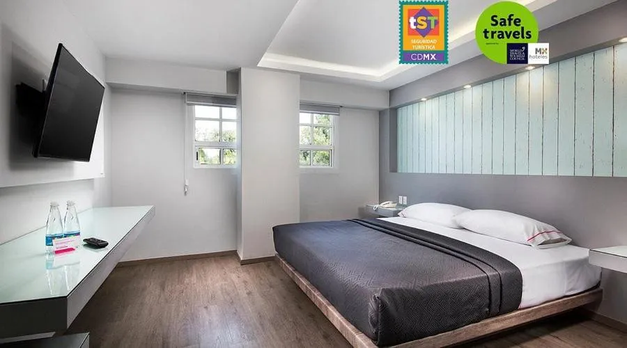 Bed in Hotel MX congreso CDMX, Trademark Collection by Wyndham