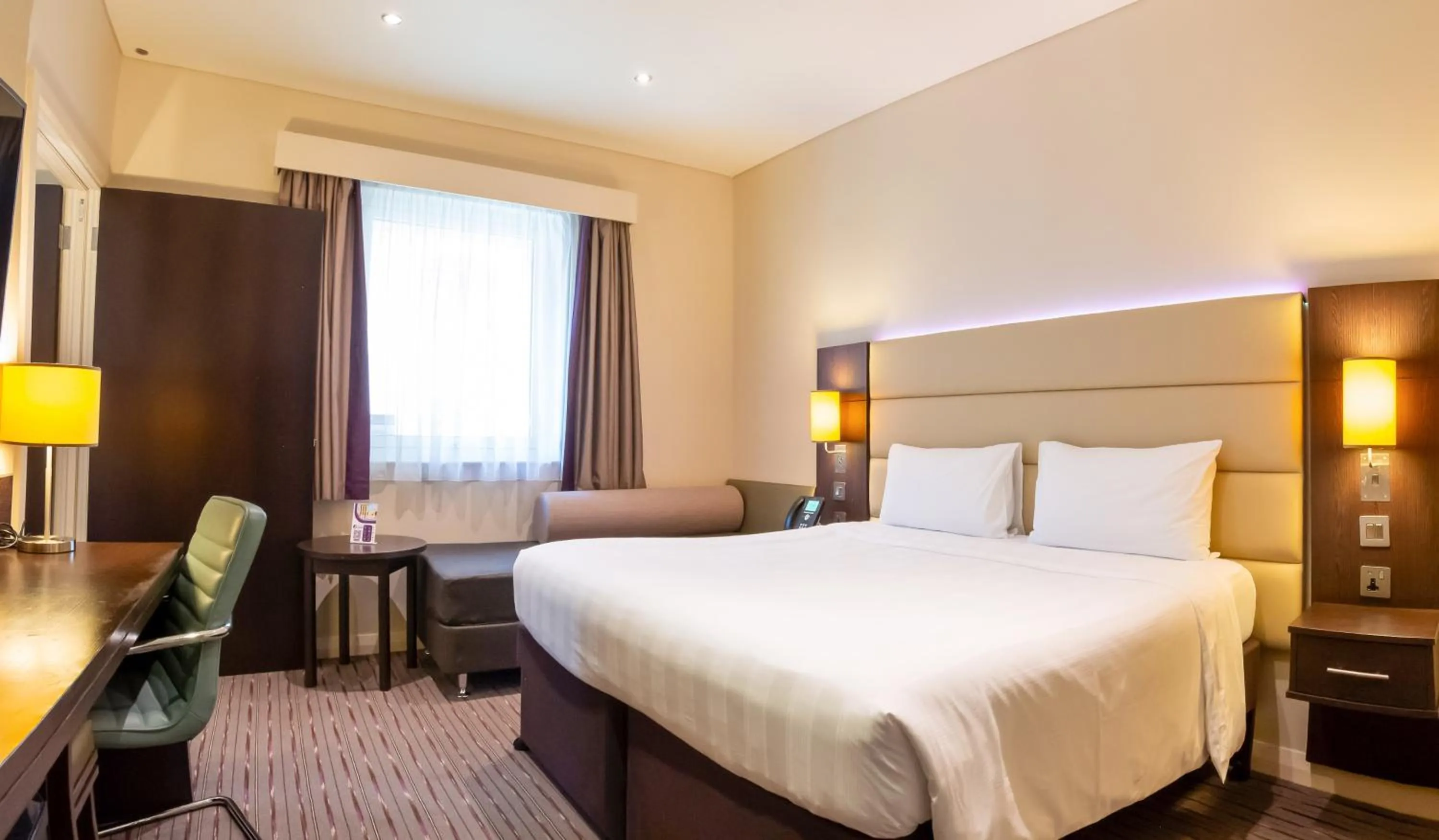 Bed in Premier Inn Doha Airport