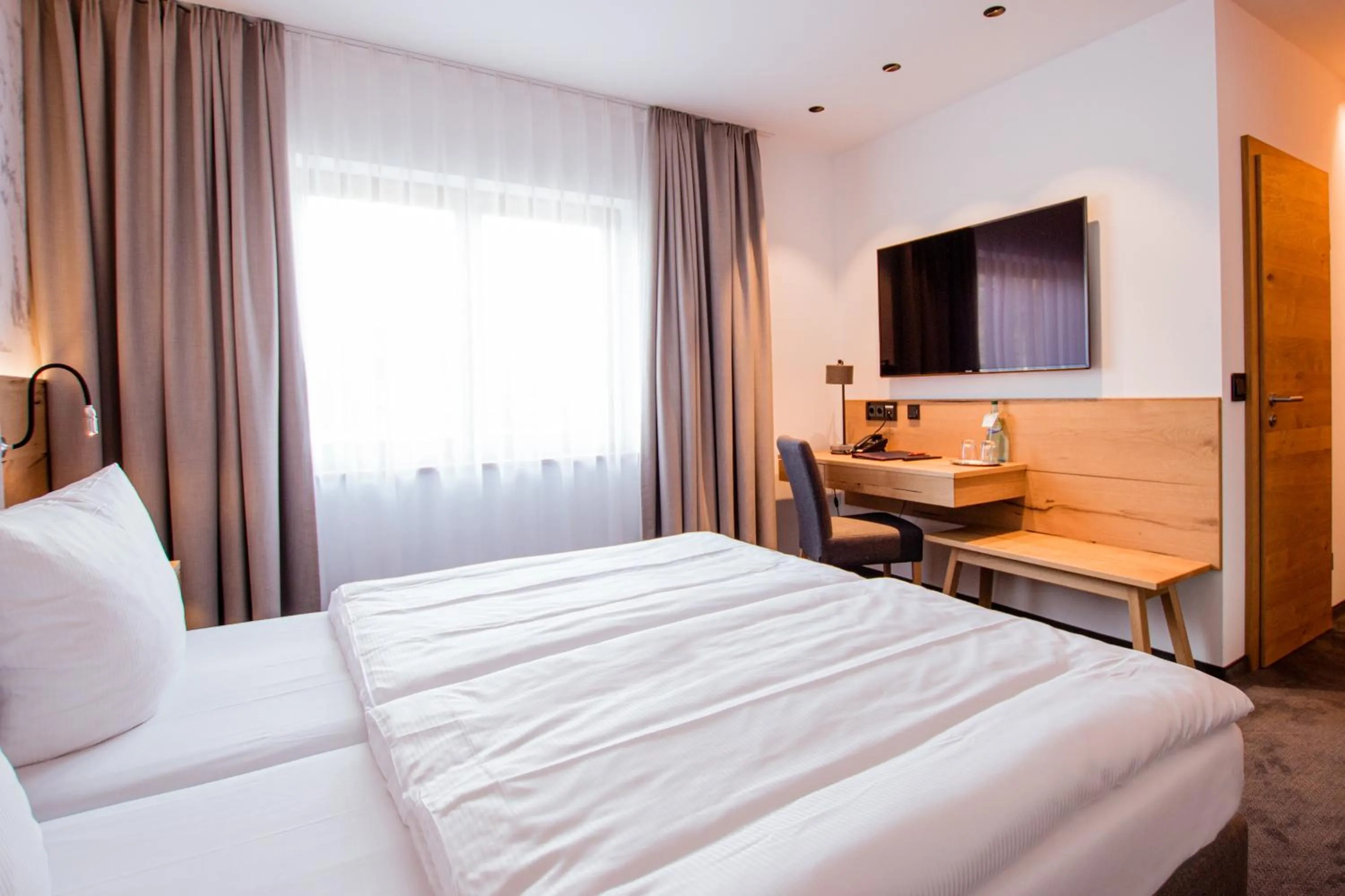 Bed in Hotel Tannenhaus