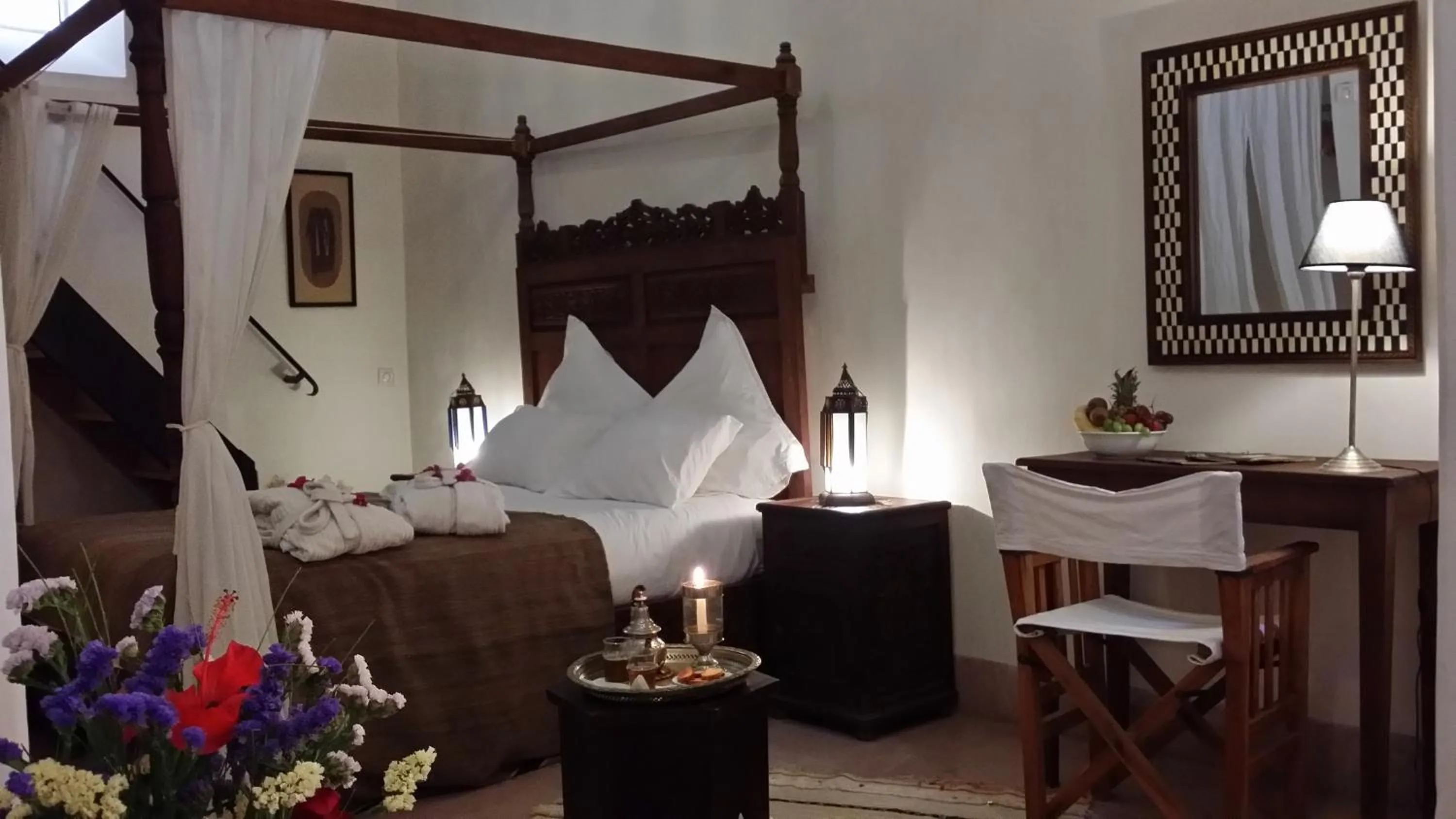 Seating area, Bed in Riad Al Ksar & Spa