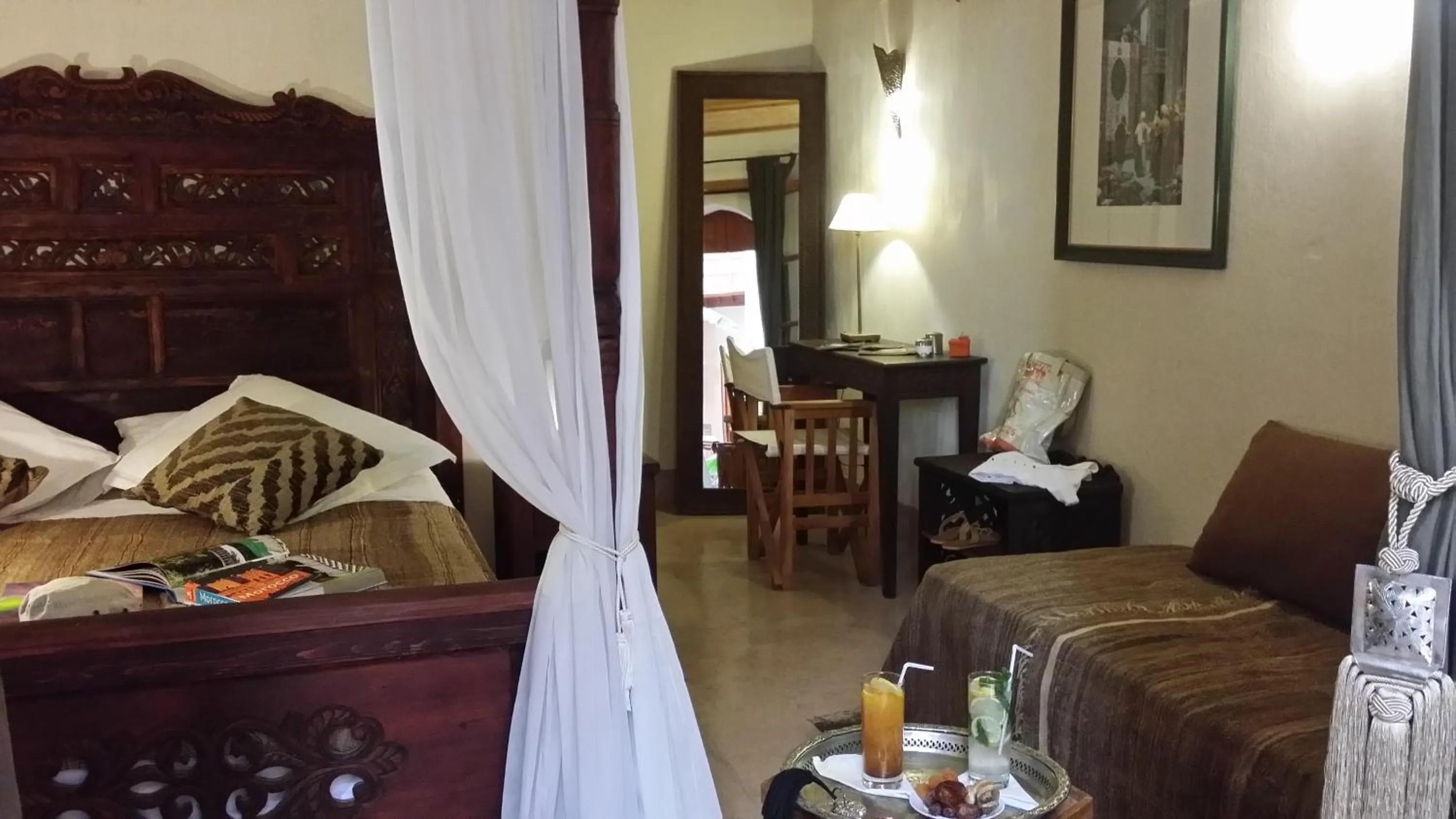 Seating area, Bed in Riad Al Ksar & Spa