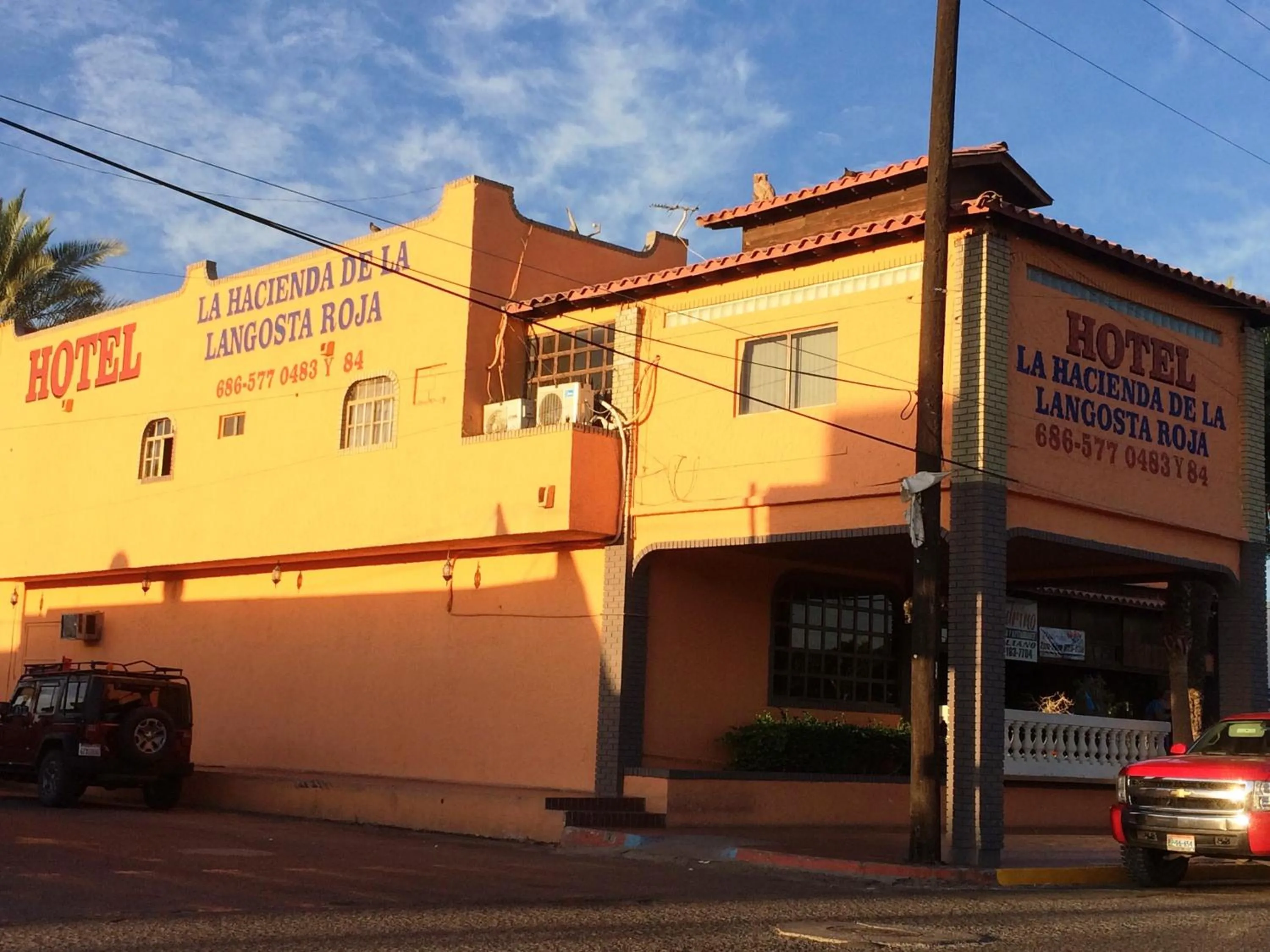 Property building in Hotel La Hacienda de la Langosta Roja